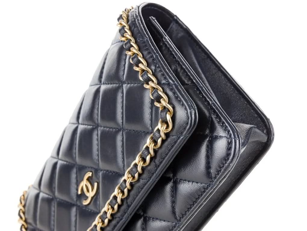 CHANEL Navy Blue Chain Around quilted Lambskin / Gold hardware wallet on a chain