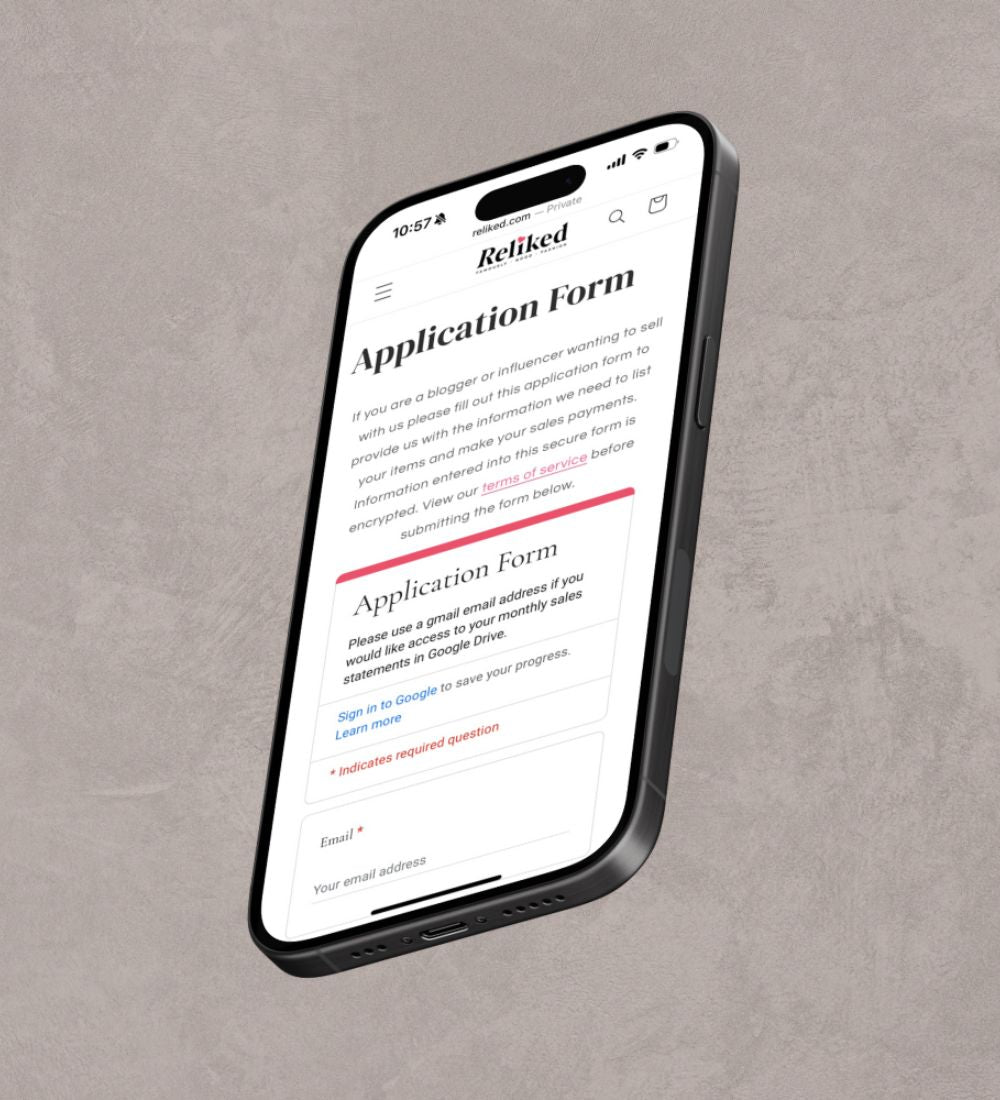 Phone displaying an application form on a gray background