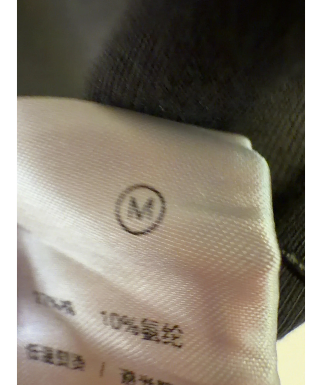 NFAI Black Colour, size UK M — care label