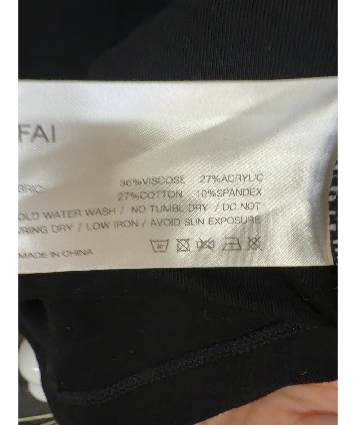 NFAI Black Push Tee — label