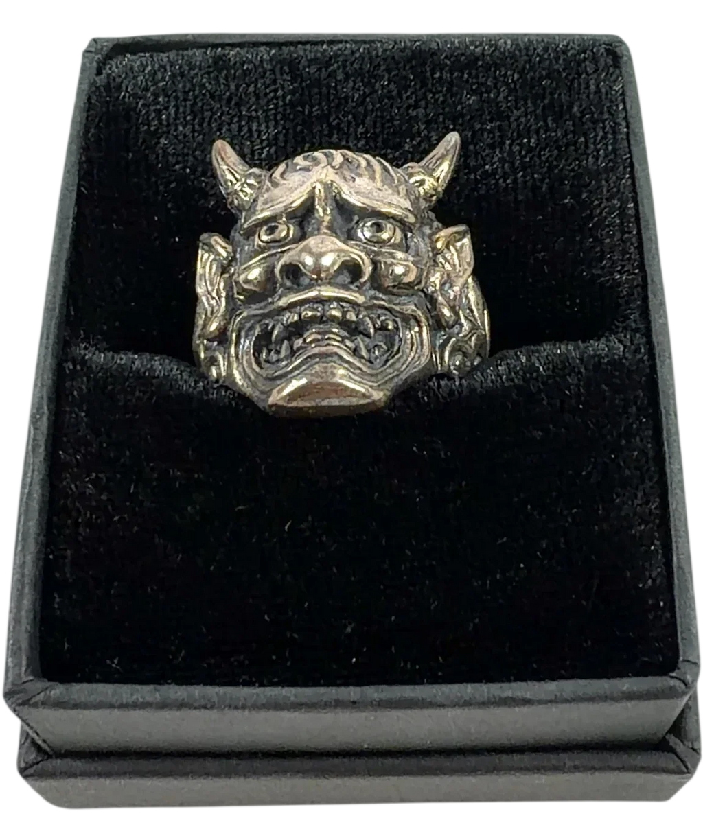 Clocks and Colours silver Hannya ring — front