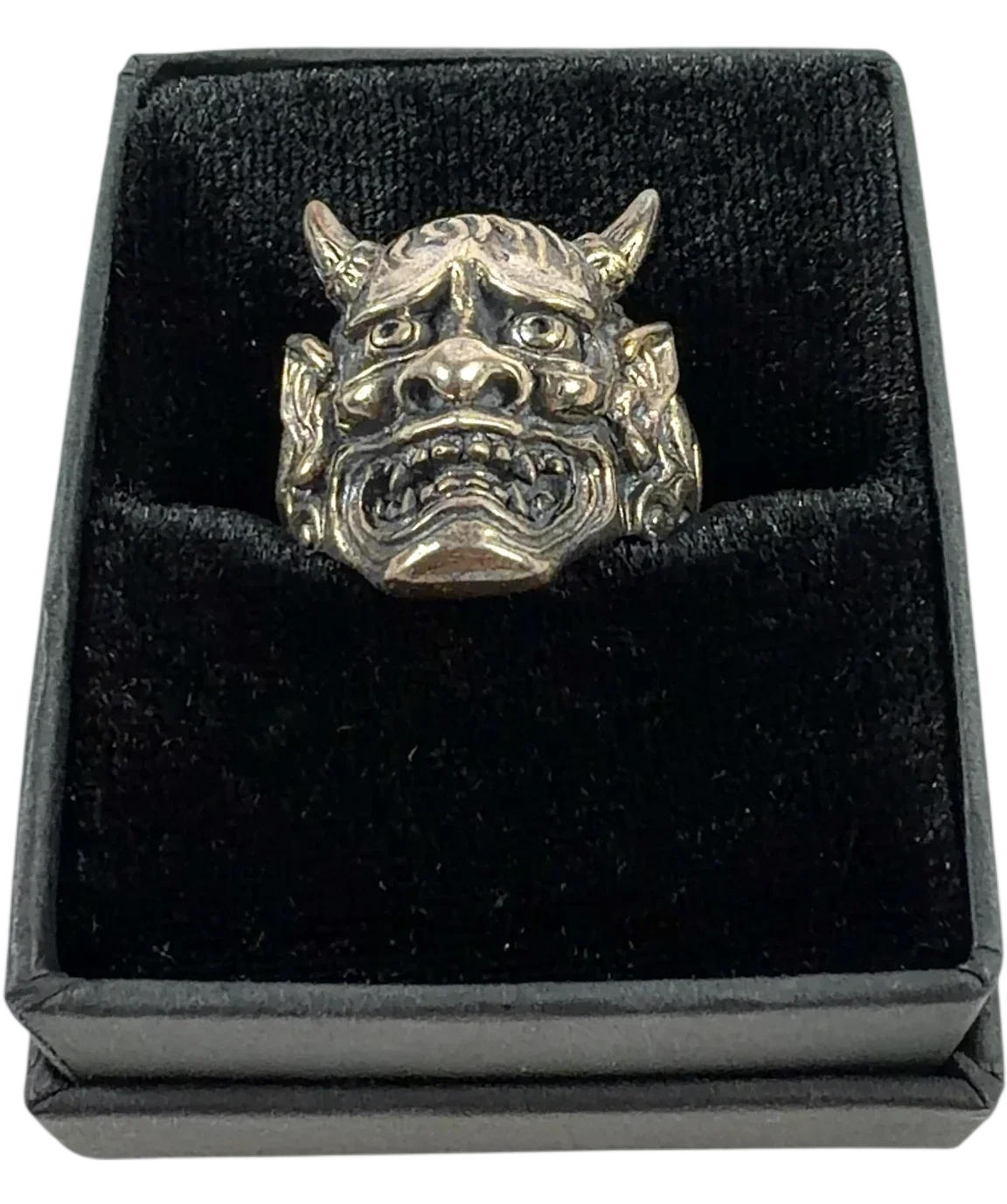 Clocks and Colours silver Hannya ring — front