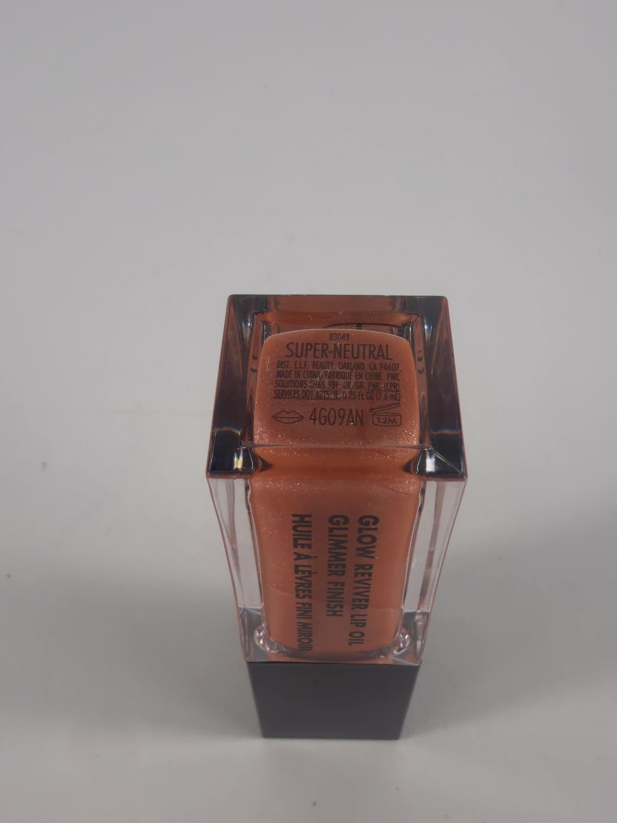 E.L.F Cosmetics super natural QC Glow Reviver Lip Oil Glimmer Finish — detail