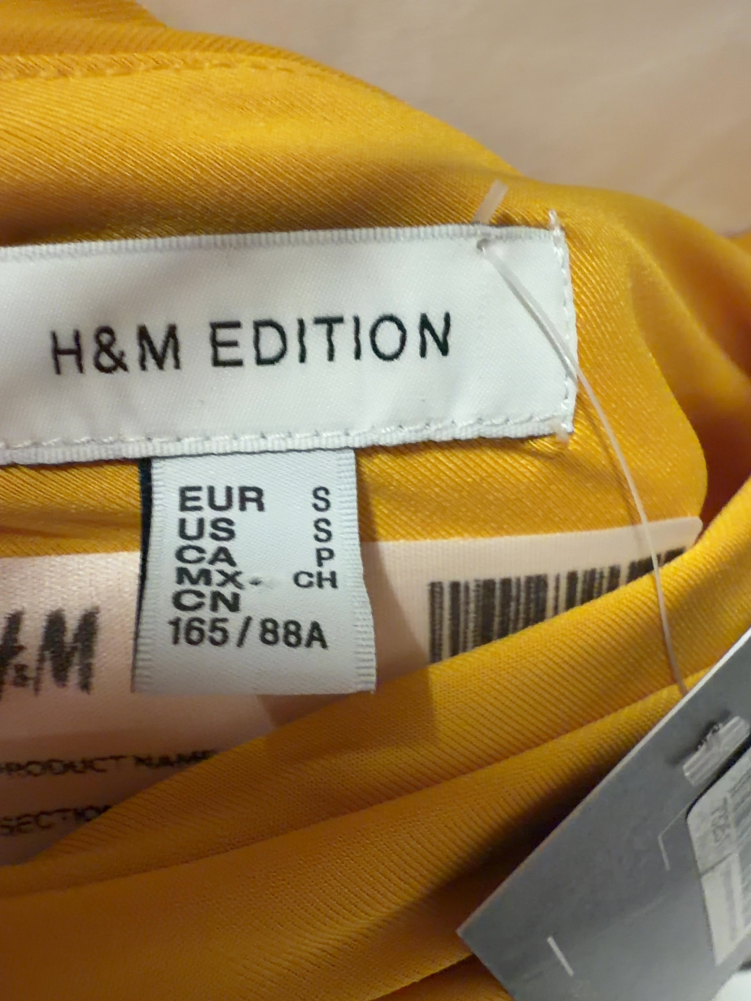 H&M Yellow Edition Jerry Yellow One-Shoulder Bubble-Hem Dress, size UK S — care label