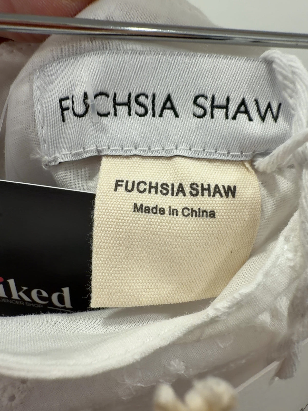 FUCHSIA SHAW Cream Cream Lace Halter Top — care label