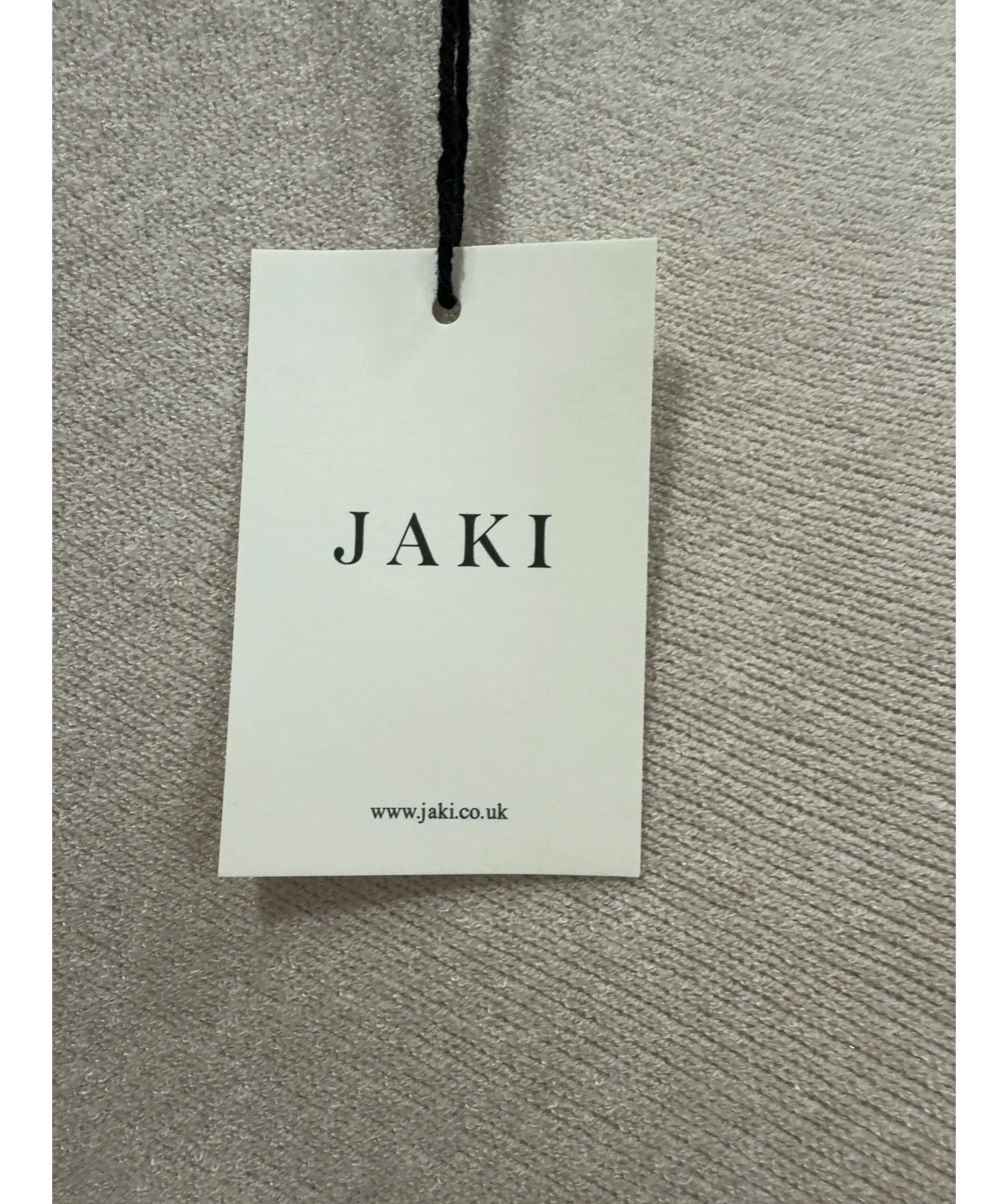JAKI LONDON Beige Asymmetric Draped Seamless Knit Jumper Light Beige, size UK S/M — detail
