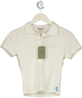Dairy Boy White Baby Polo Soft White, size UK S — front