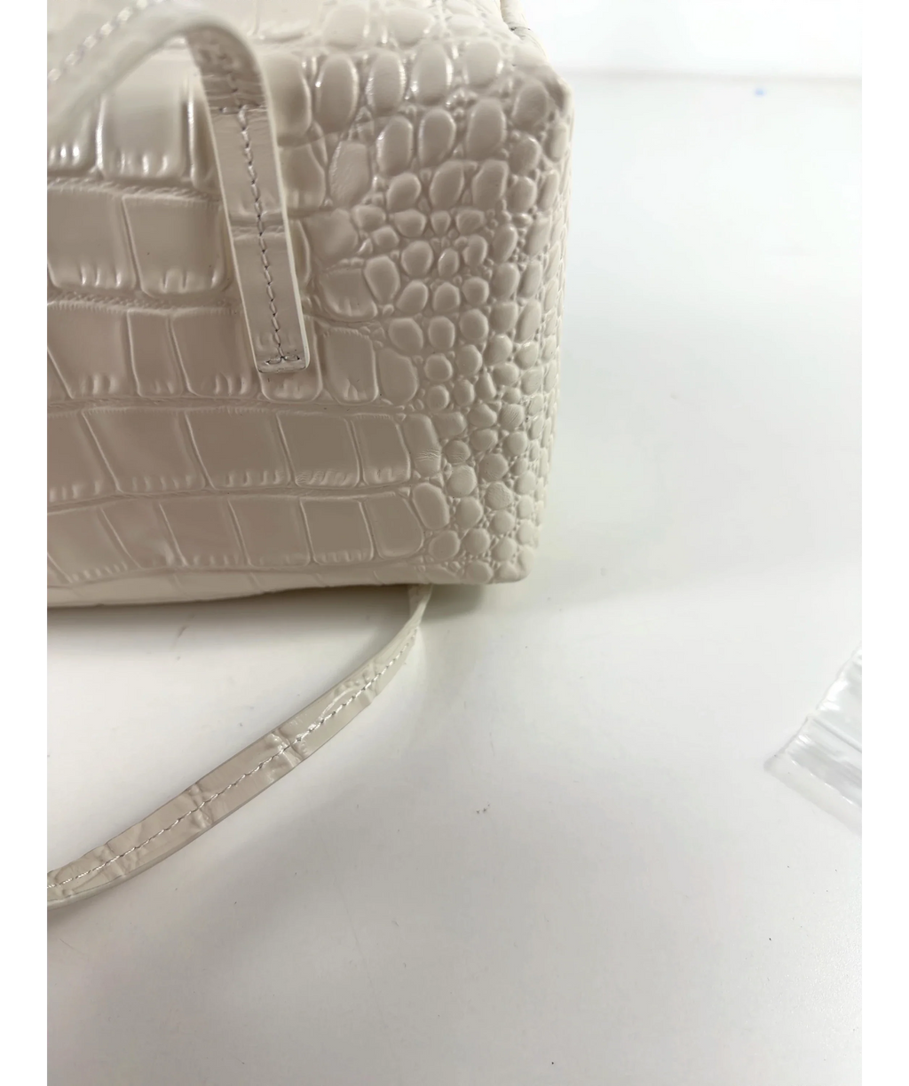 by mina Cream Colour — care label