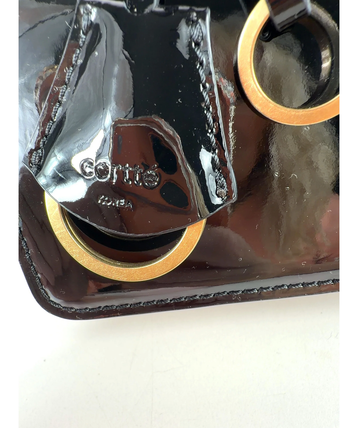 CORTTE Black Colour — label