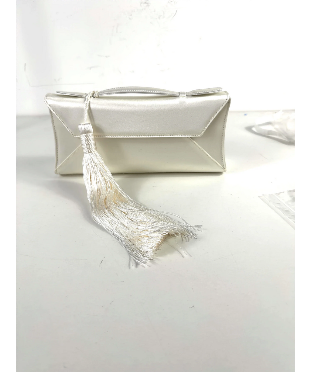 AUREUM White Cassandra Clutch Tassel — care label