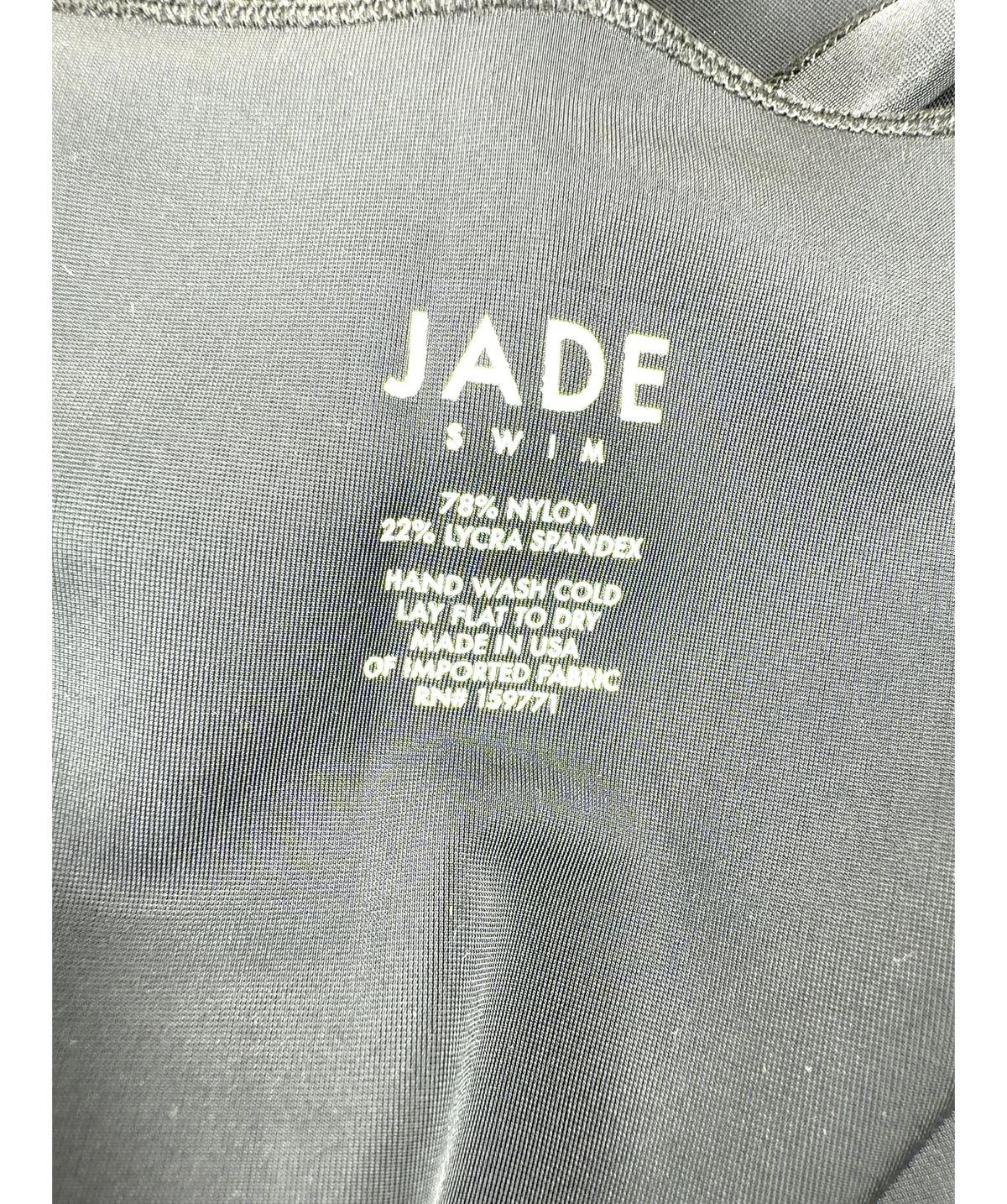 JADE SWIM Black Nyla Long Beach Cover-Up — label