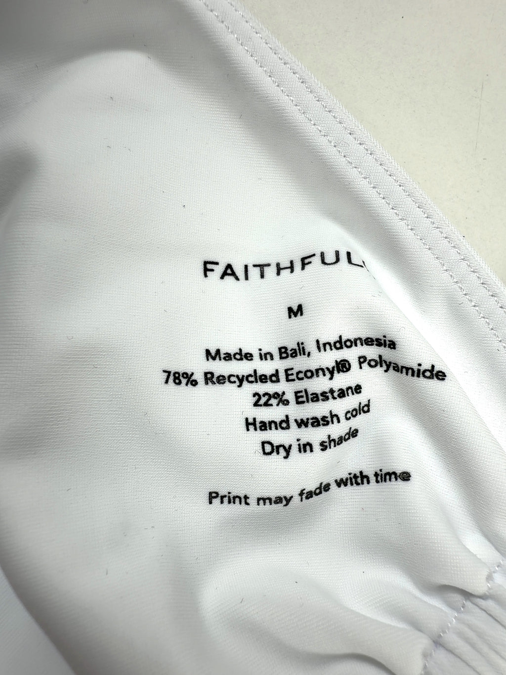 FAITHFUL White Colour, size UK M — care label