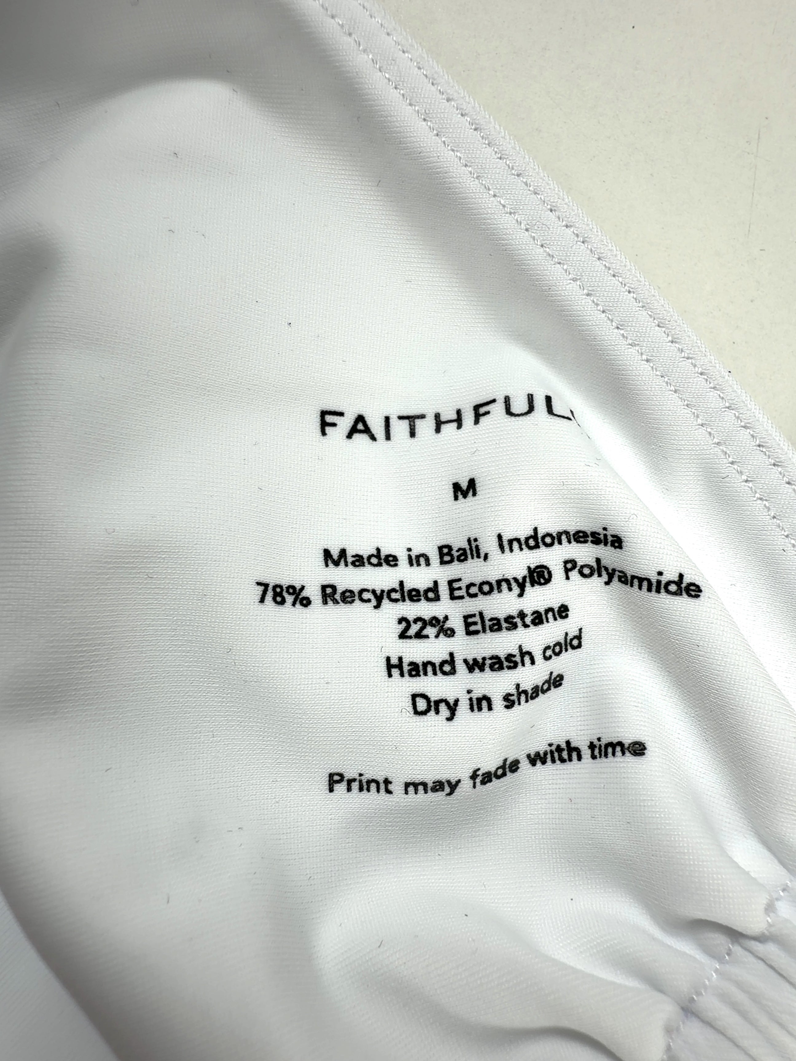 FAITHFUL White Colour, size UK M — care label