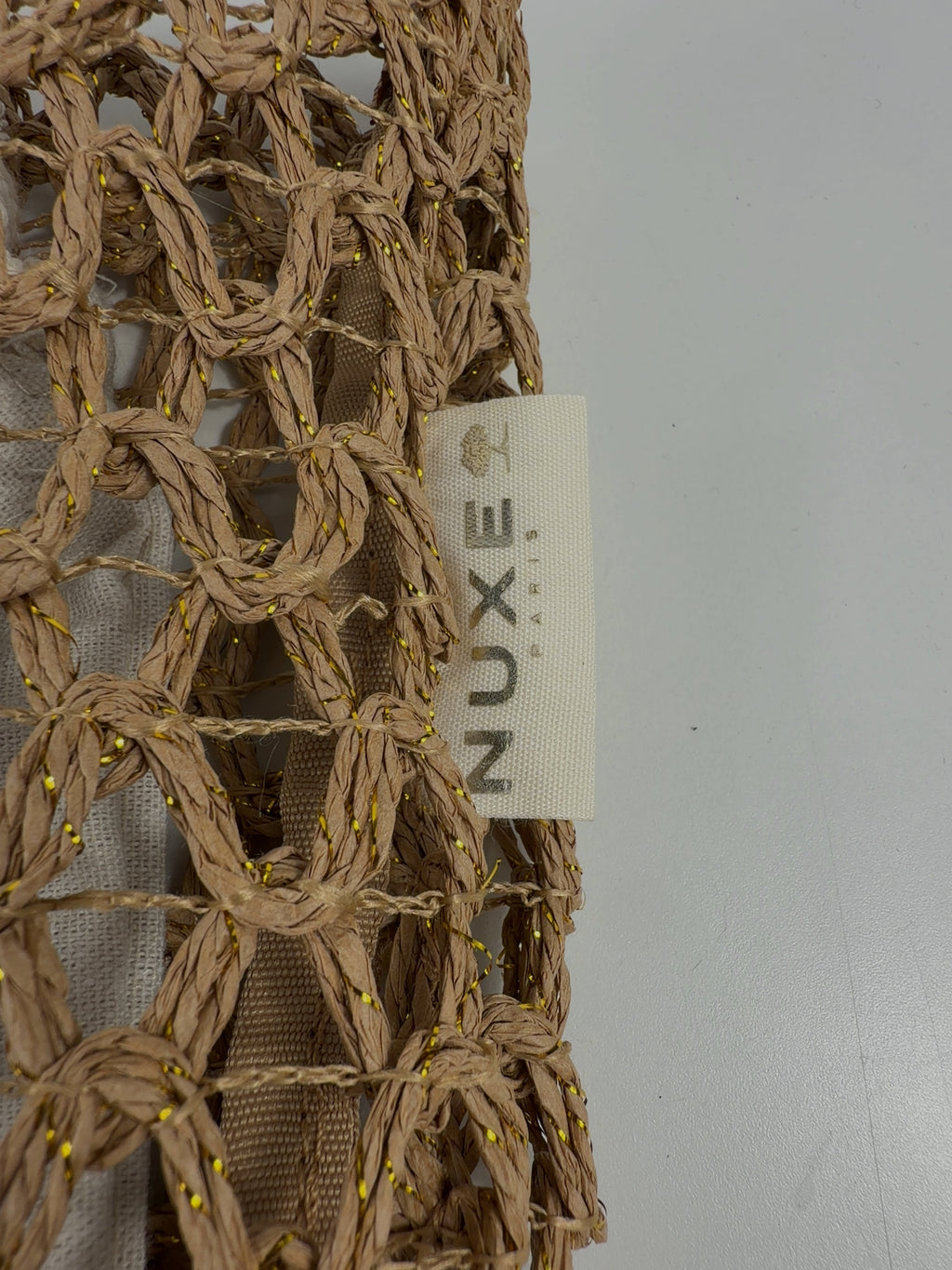 Nuxe Beige Woven Straw Summer Beach Bag — label
