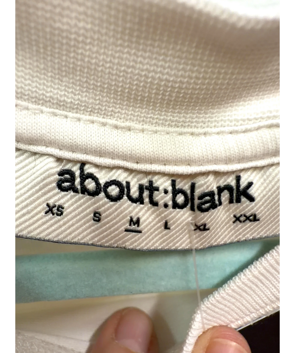 about:blank White Sports Division T-Shirt, size UK M — care label
