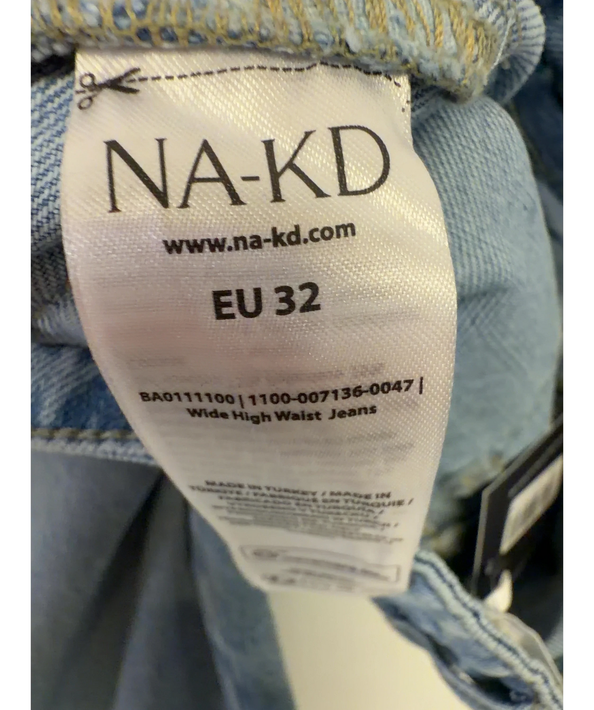 NA-KD Blue Wide High Waist Jeans, size UK 4 — care label