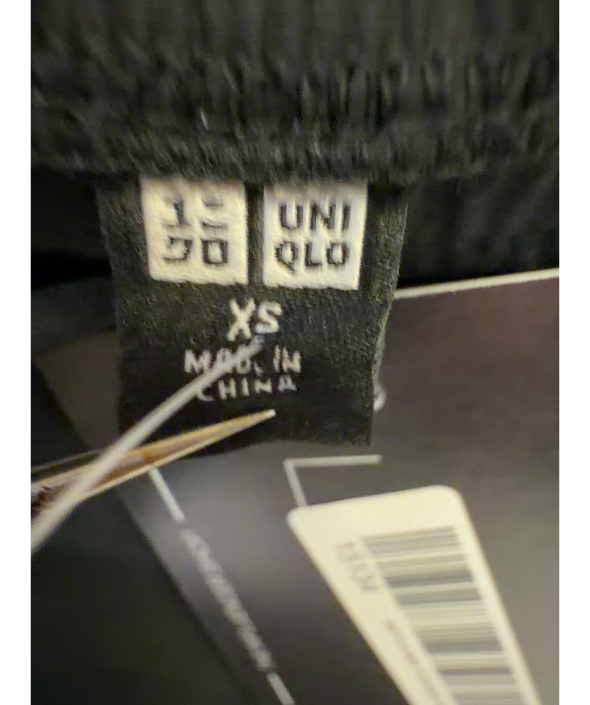 Uniqlo Black Colour, size UK XS — care label