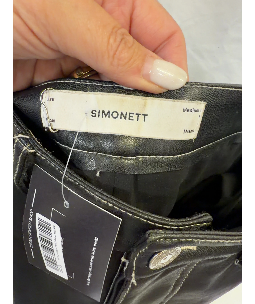 Simonett Black Colour, size UK M — care label