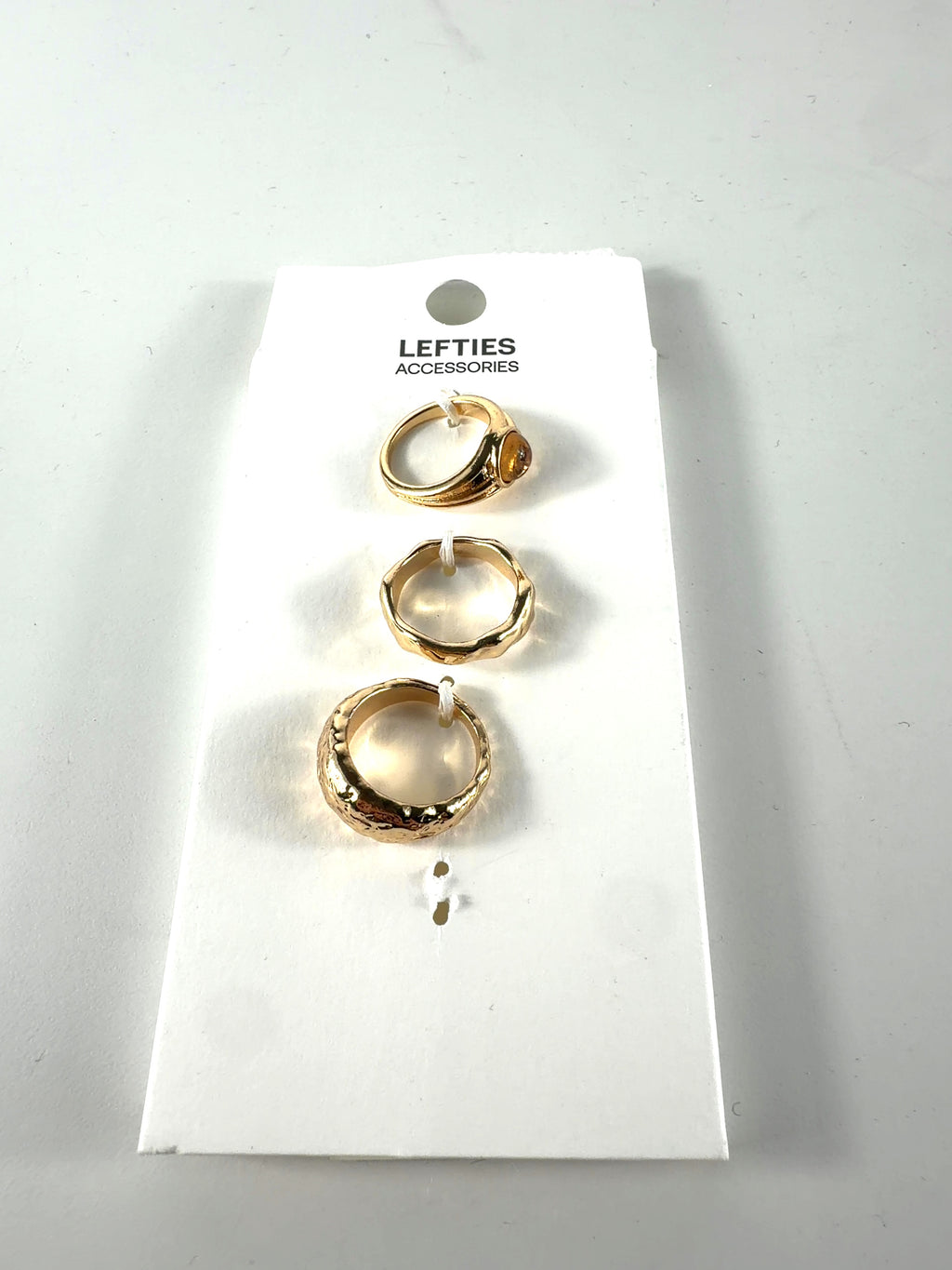 Lefties Metallic 3-PIECE GOLD RING SET, size UK M — front