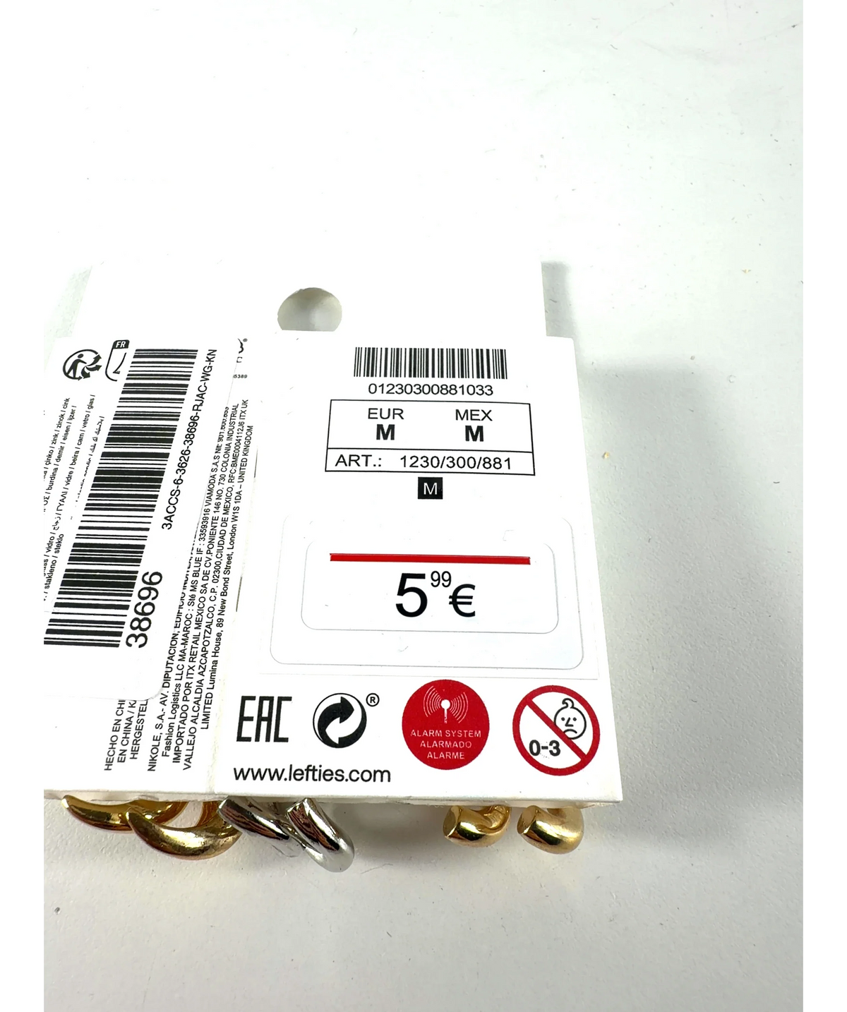 Lefties Metallic mismatched earring set — label