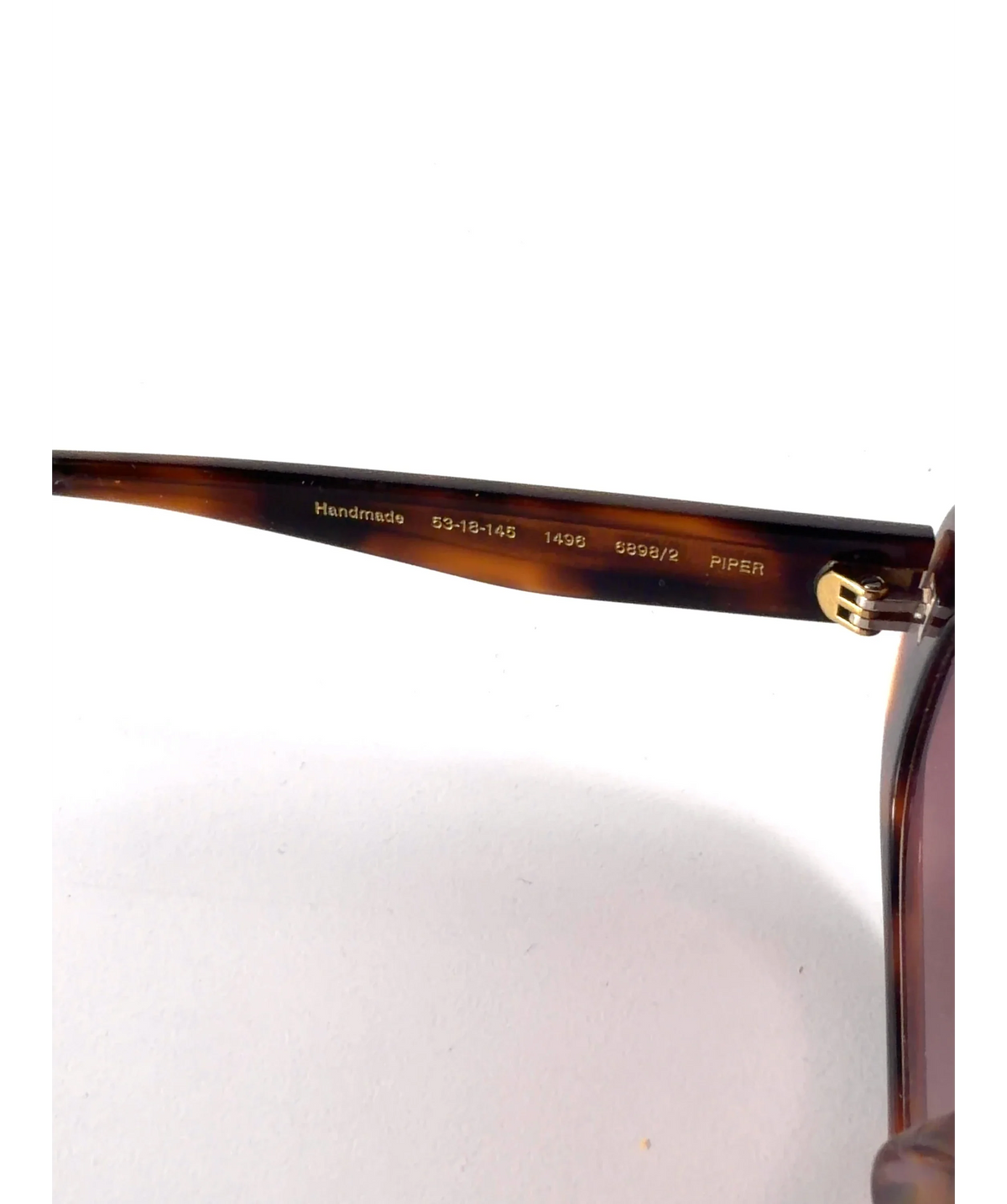 Gigi Studios Piper Brown Oval Sunglasses — Materials