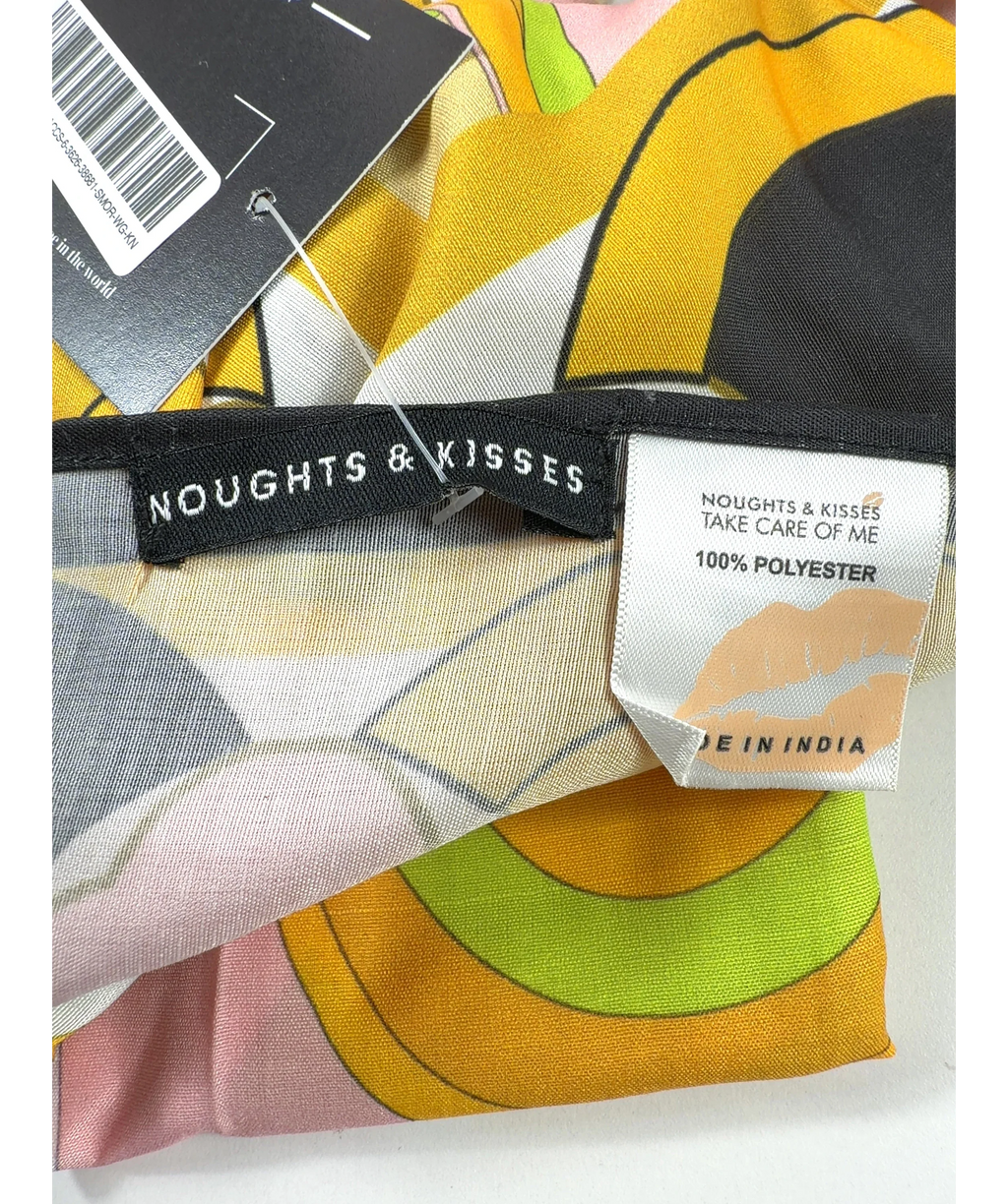 Noughts & Kisses Yellow Colour — care label