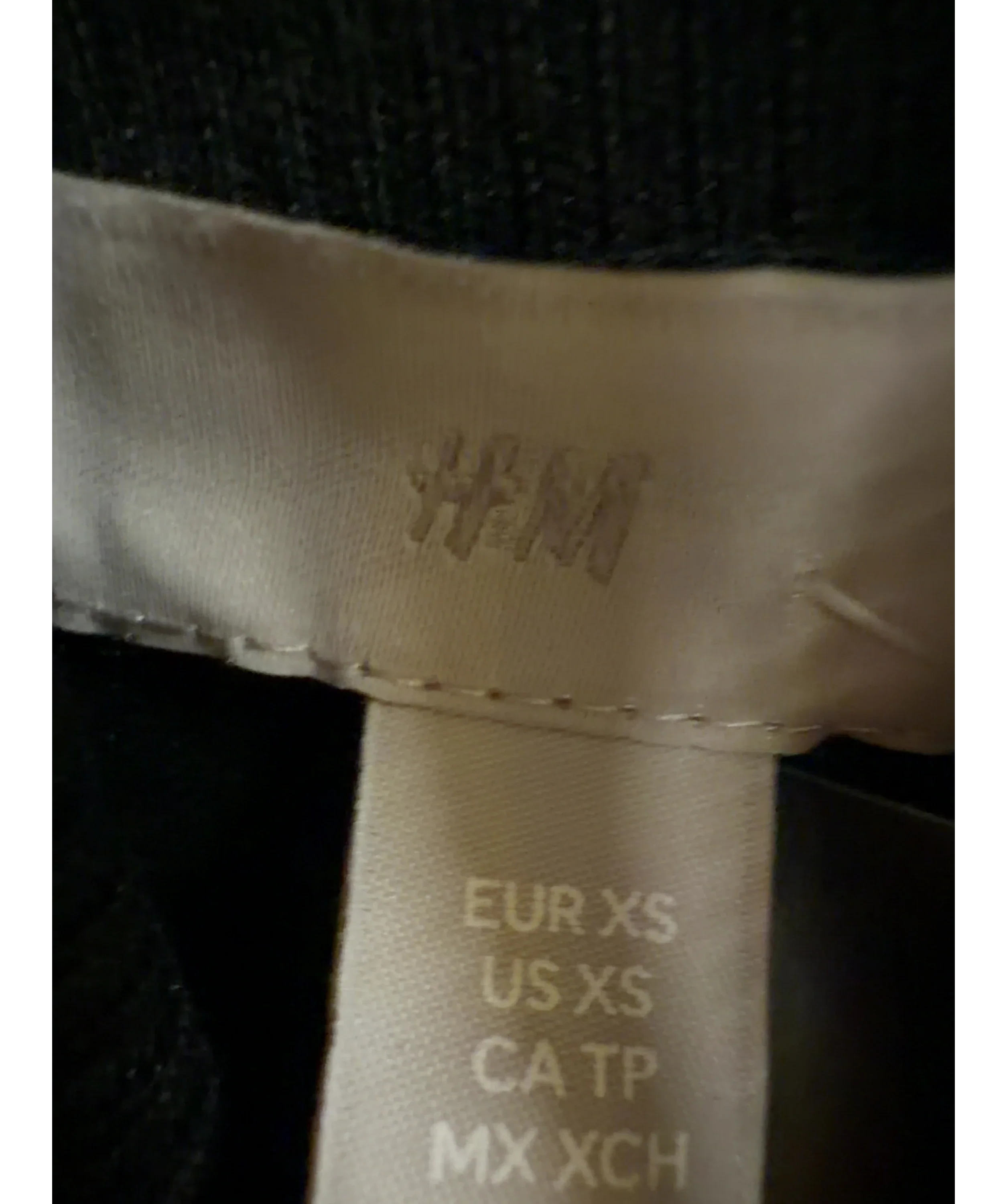 H&M Black fine-knit turtleneck sweater, size UK XS — detail