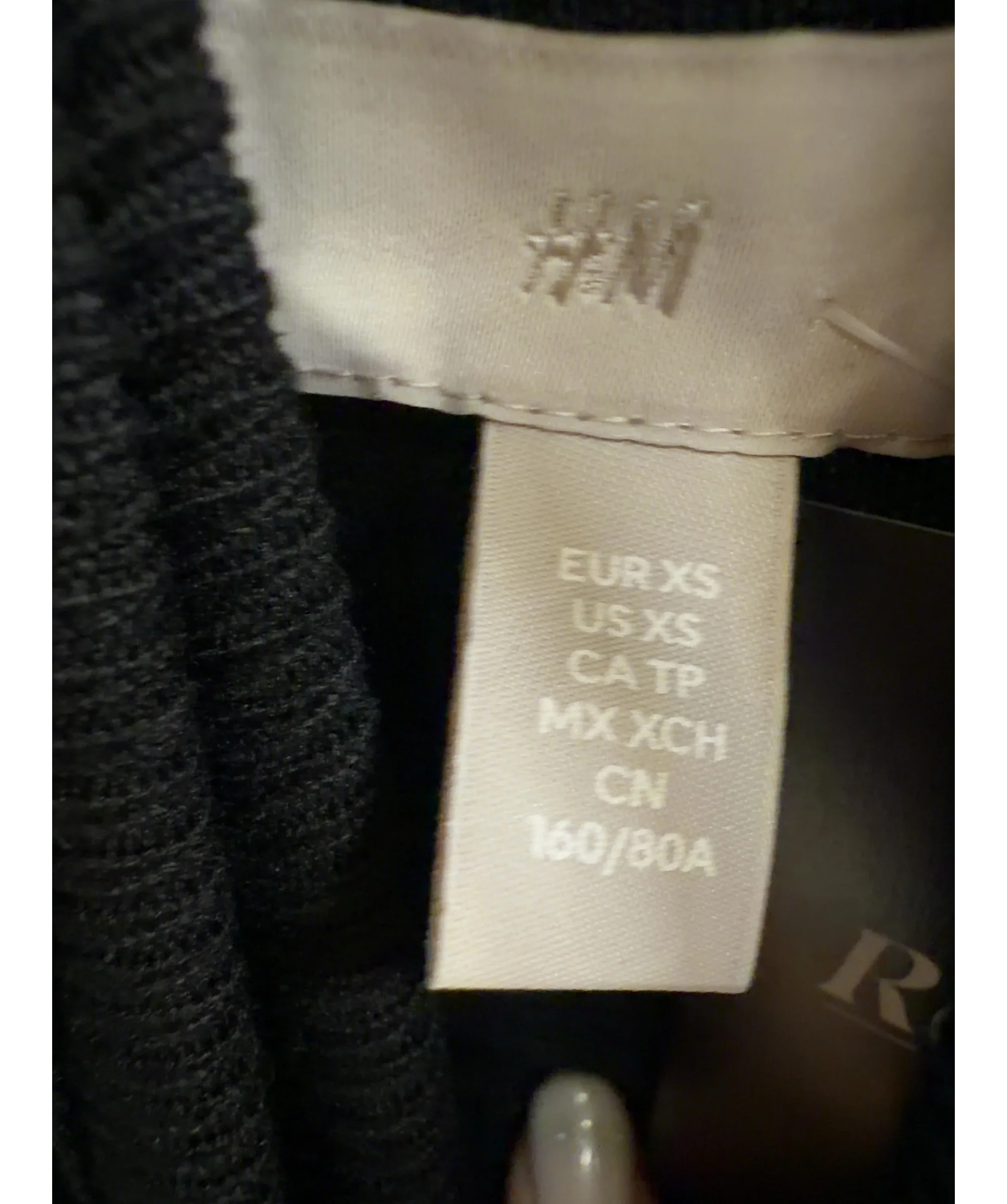 H&M Black fine-knit turtleneck sweater, size UK XS — care label
