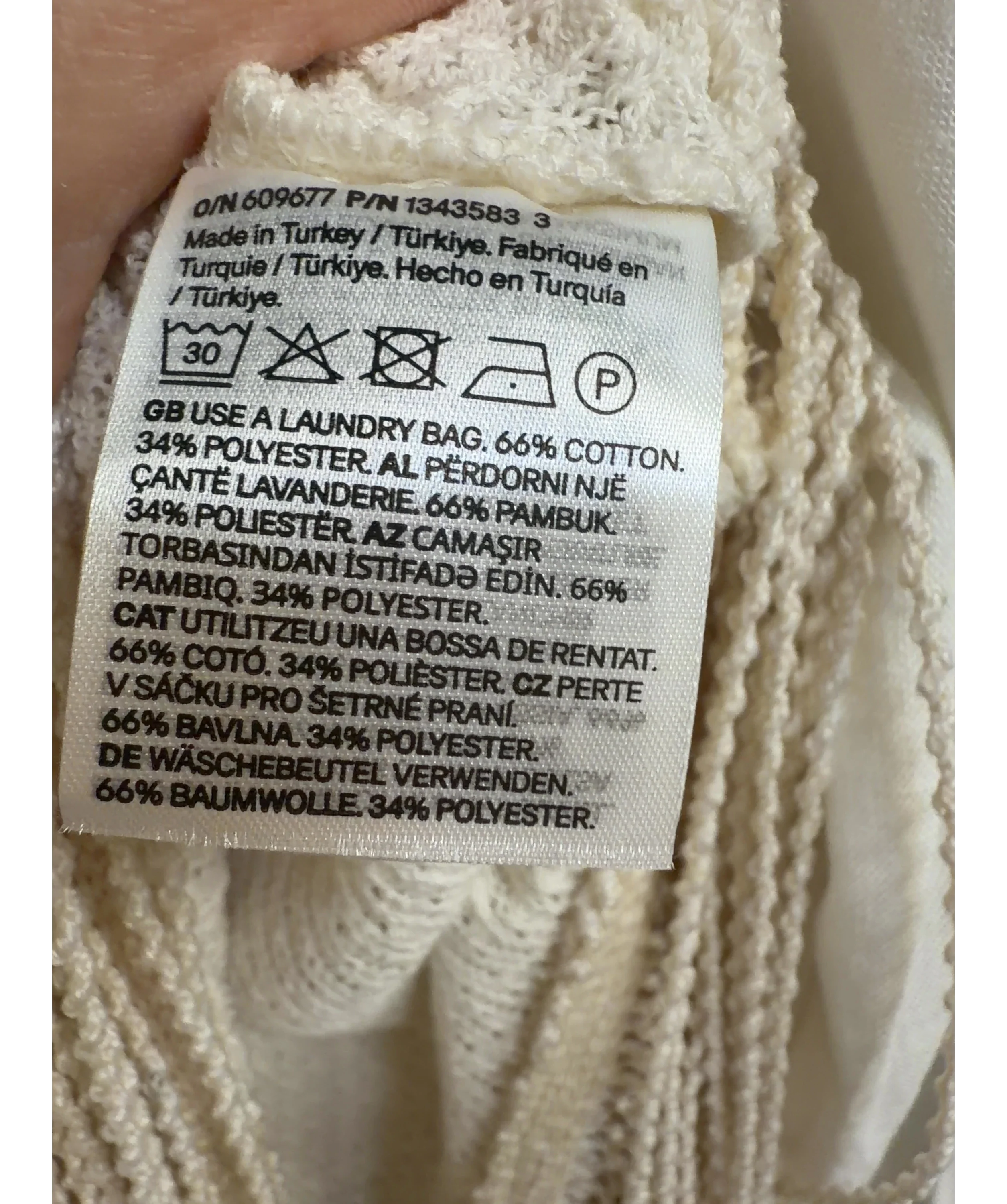H&M cream Asymmetric Fringe-Trimmed Top, size UK XS — label