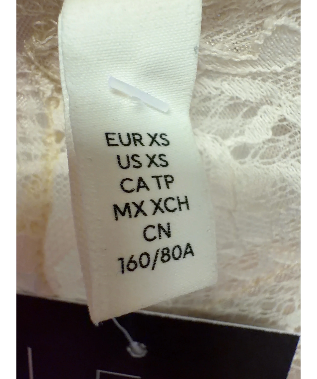 H&M Cream Colour, size UK XS — care label