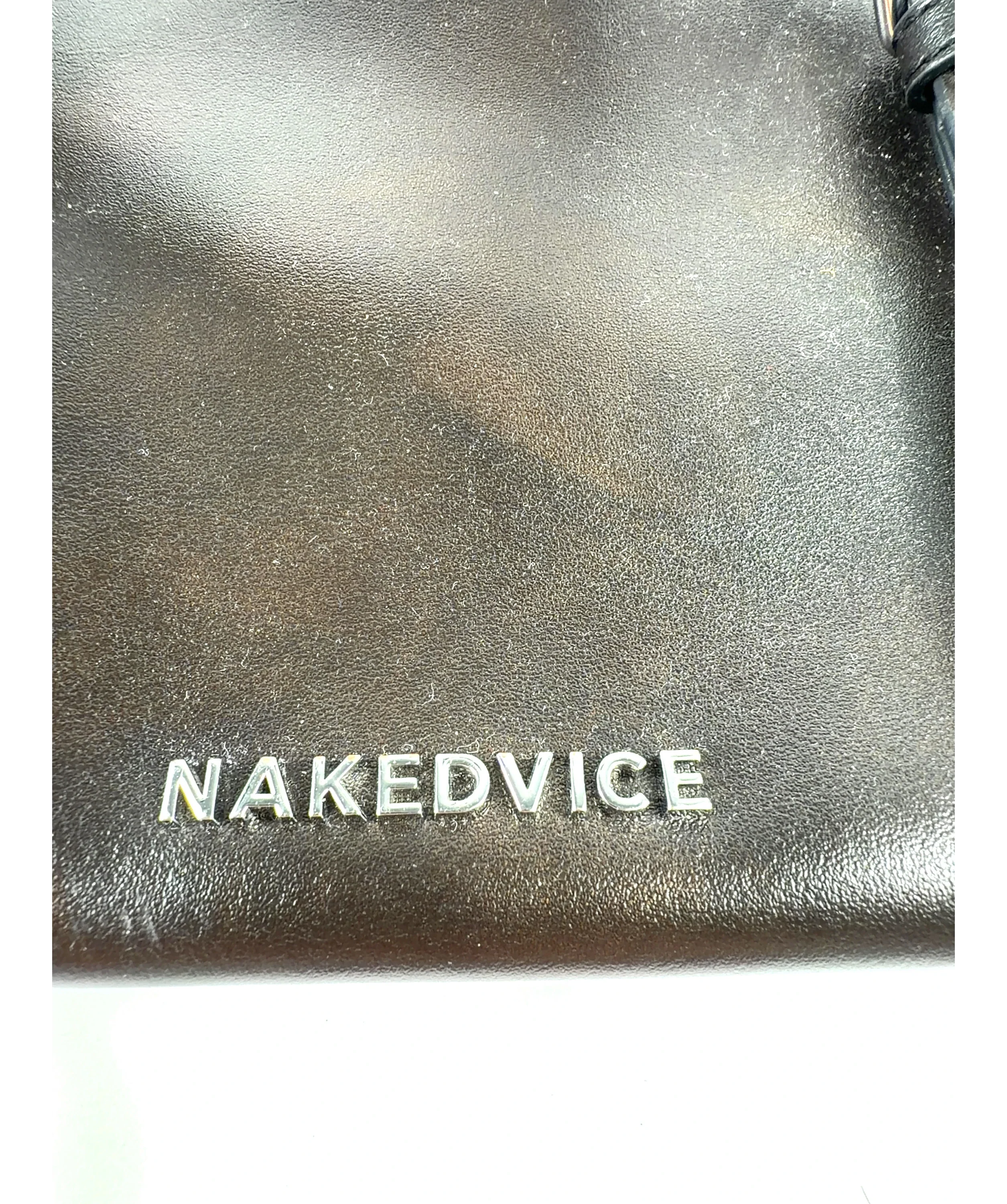 NAKED VICE Brown Novi — label