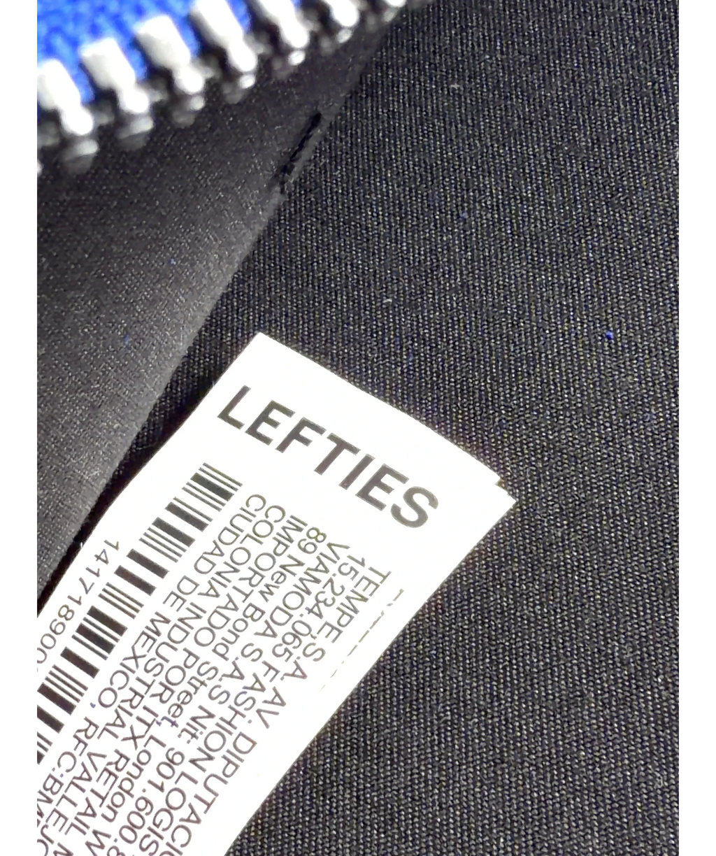 Lefties Blue Faux suede mini bowling bag — label