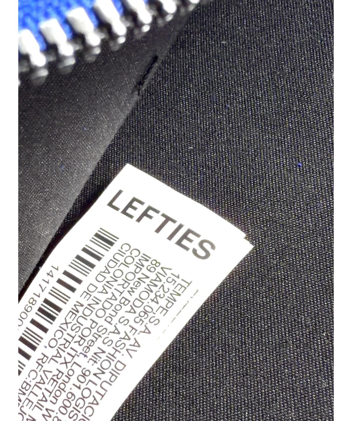 Lefties Blue Faux suede mini bowling bag — label