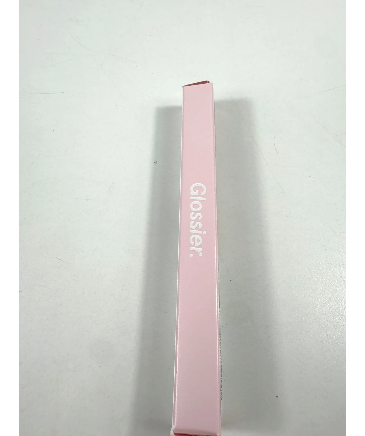 glossier BIT Shade, size 1.2g — label
