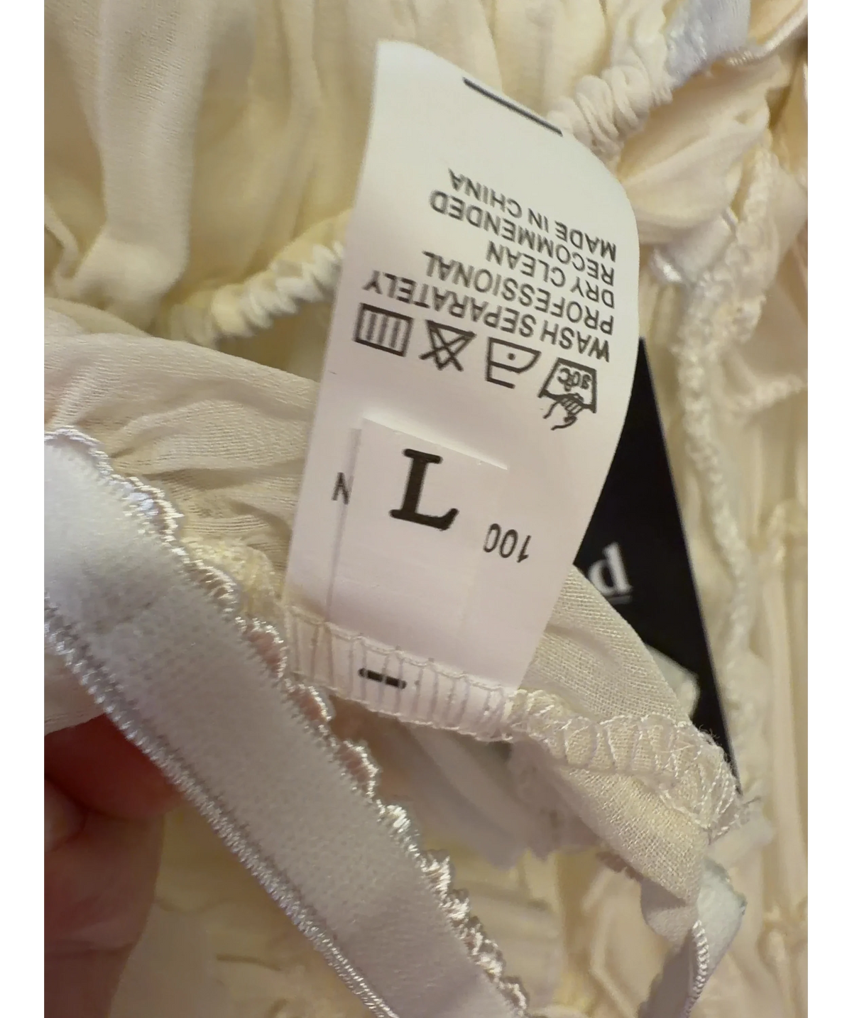 Arcina Ori Cream Colour, size UK L — care label