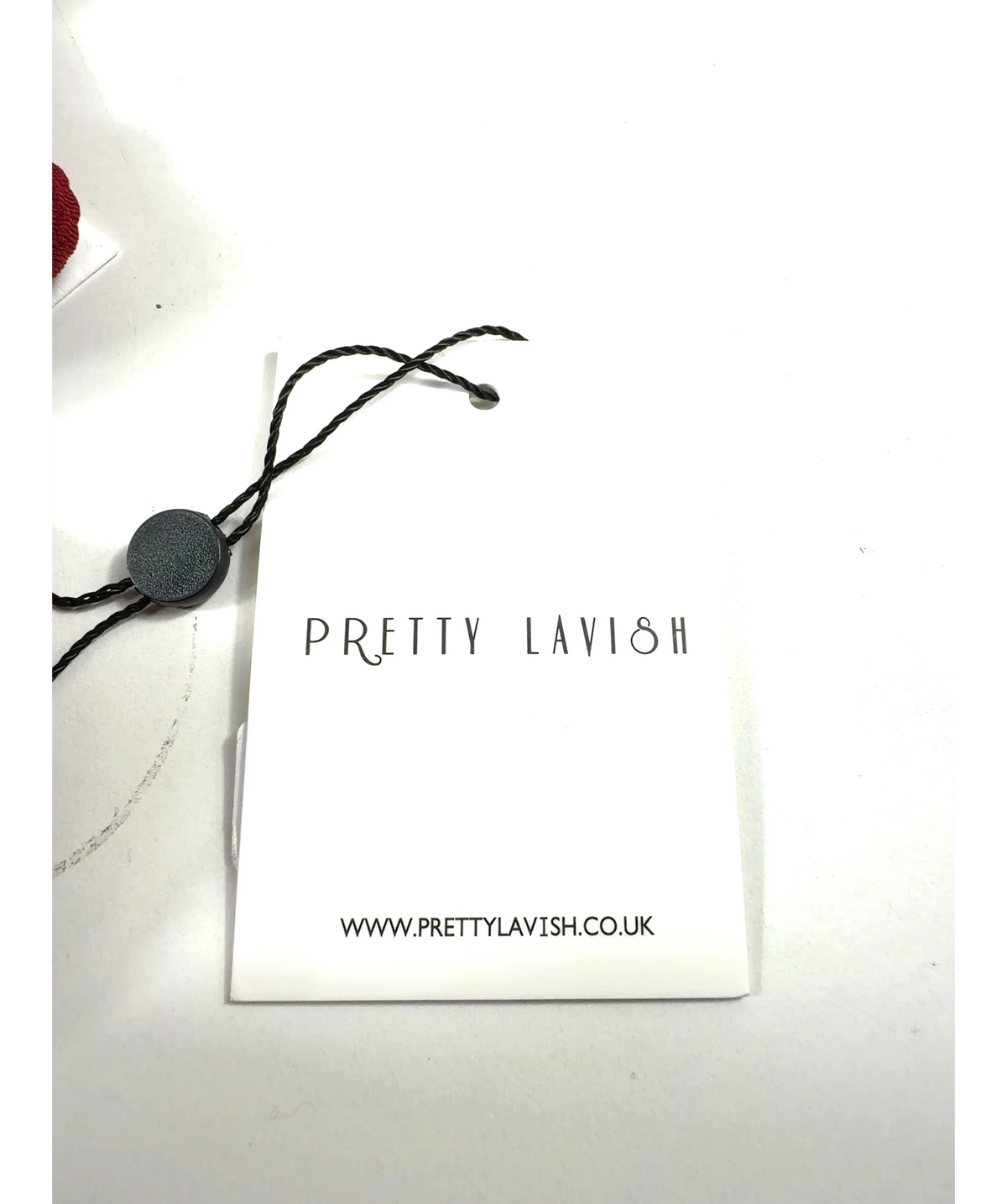 PRETTY LAVISH Red Colour, size UK M — care label