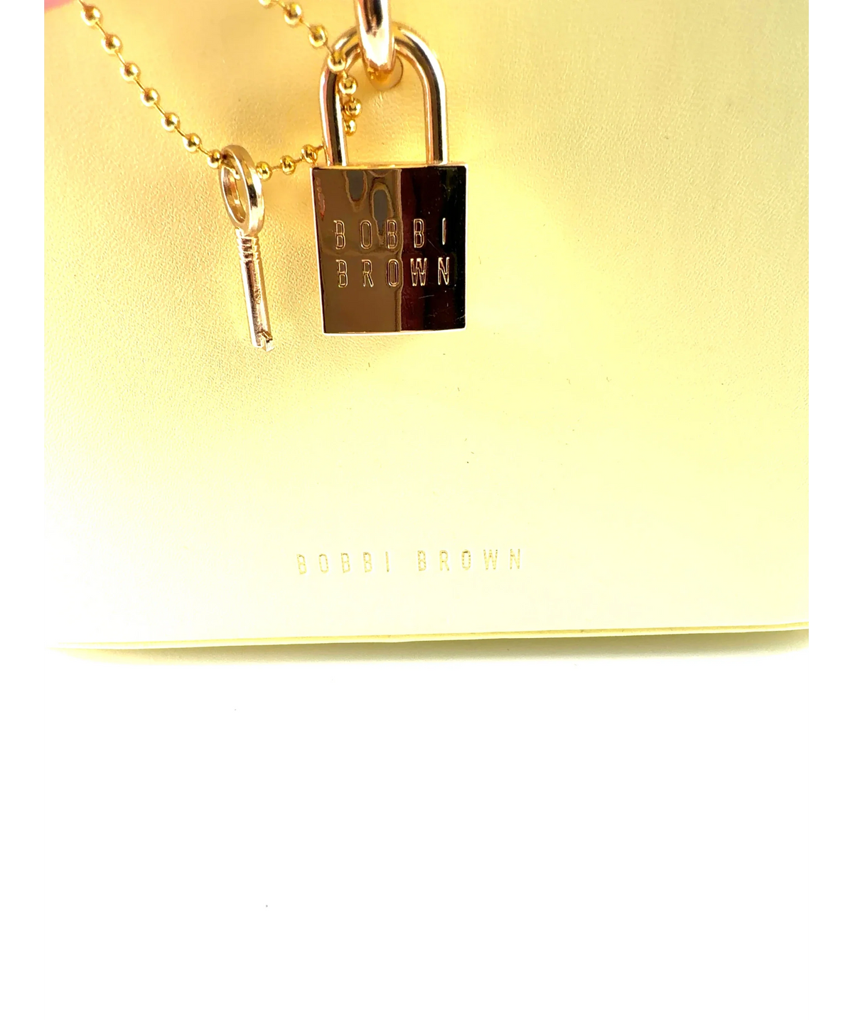 Bobbi Brown YELLOW vanity case — label