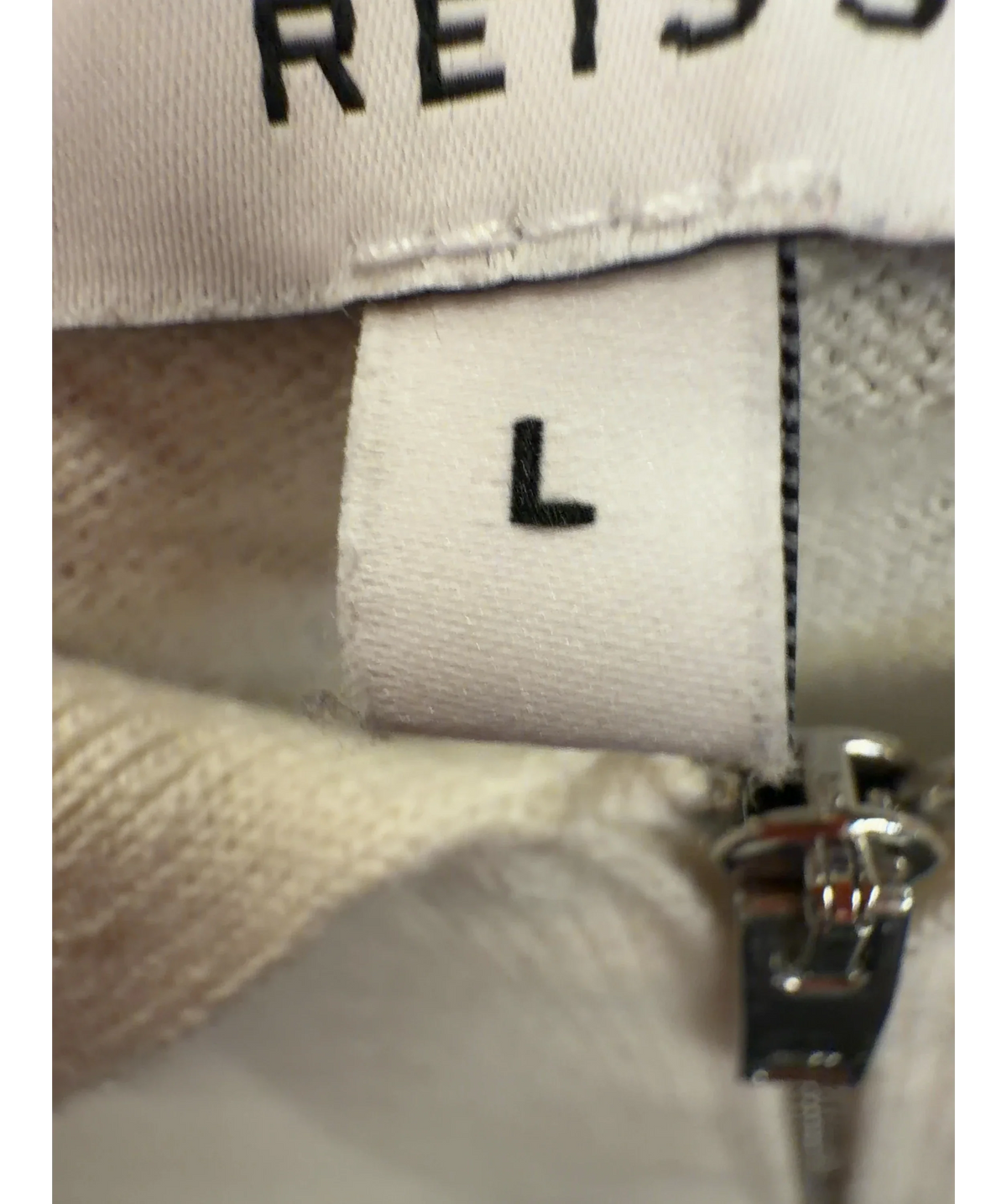 REISS Cream color-blocked half-zip knitted polo shirt, size UK L — care label