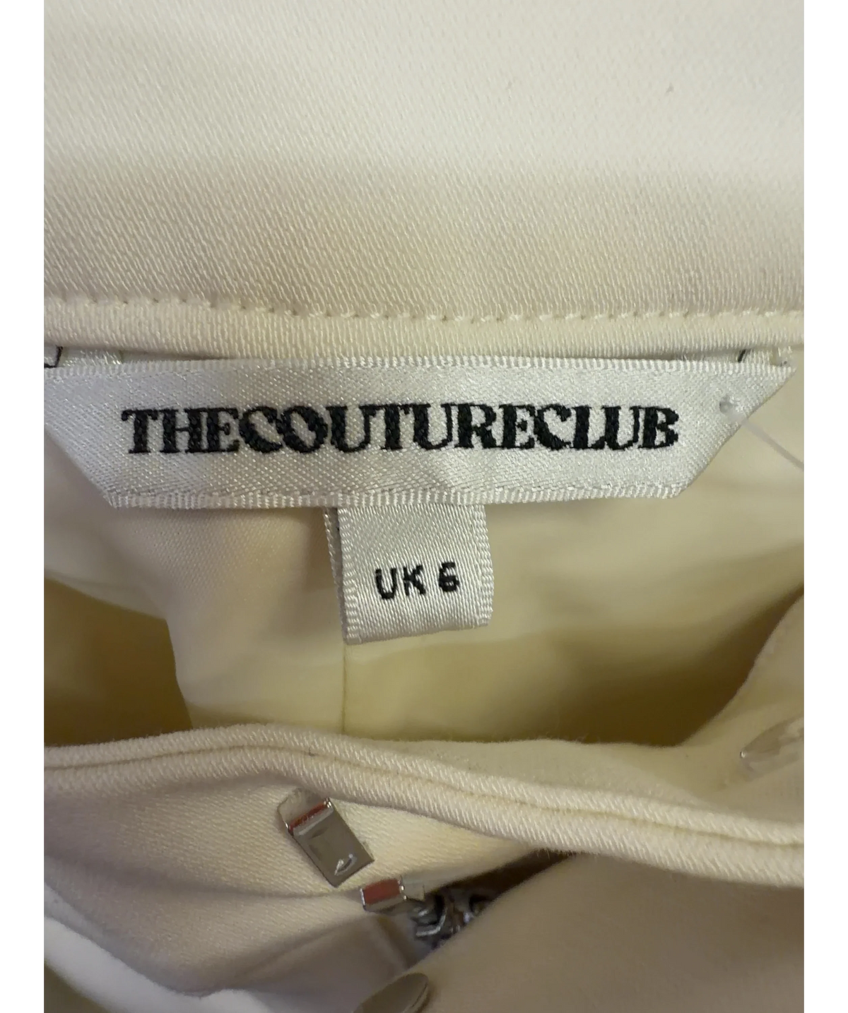 The Couture Club Cream pleated trousers, size UK 6 — detail