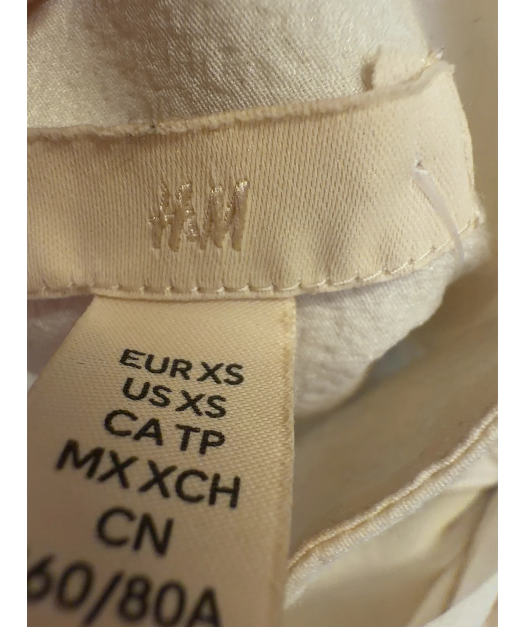 H&M cream Colour, size UK XS — care label
