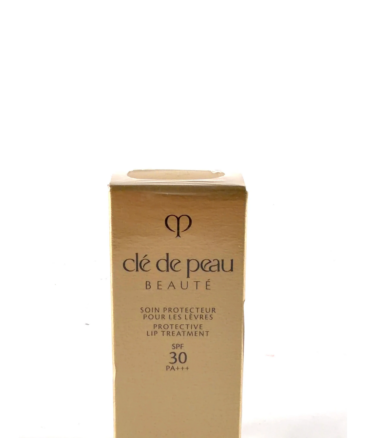 Clé de Peau Beauté SOIN PROTECTEUR POUR LES LEVRES PROTECTIVE LIP TREATMENT, size 4g — label