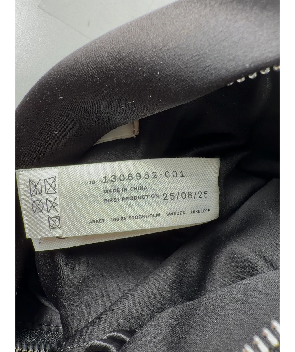 ARKET Black Tassel Bag — care label