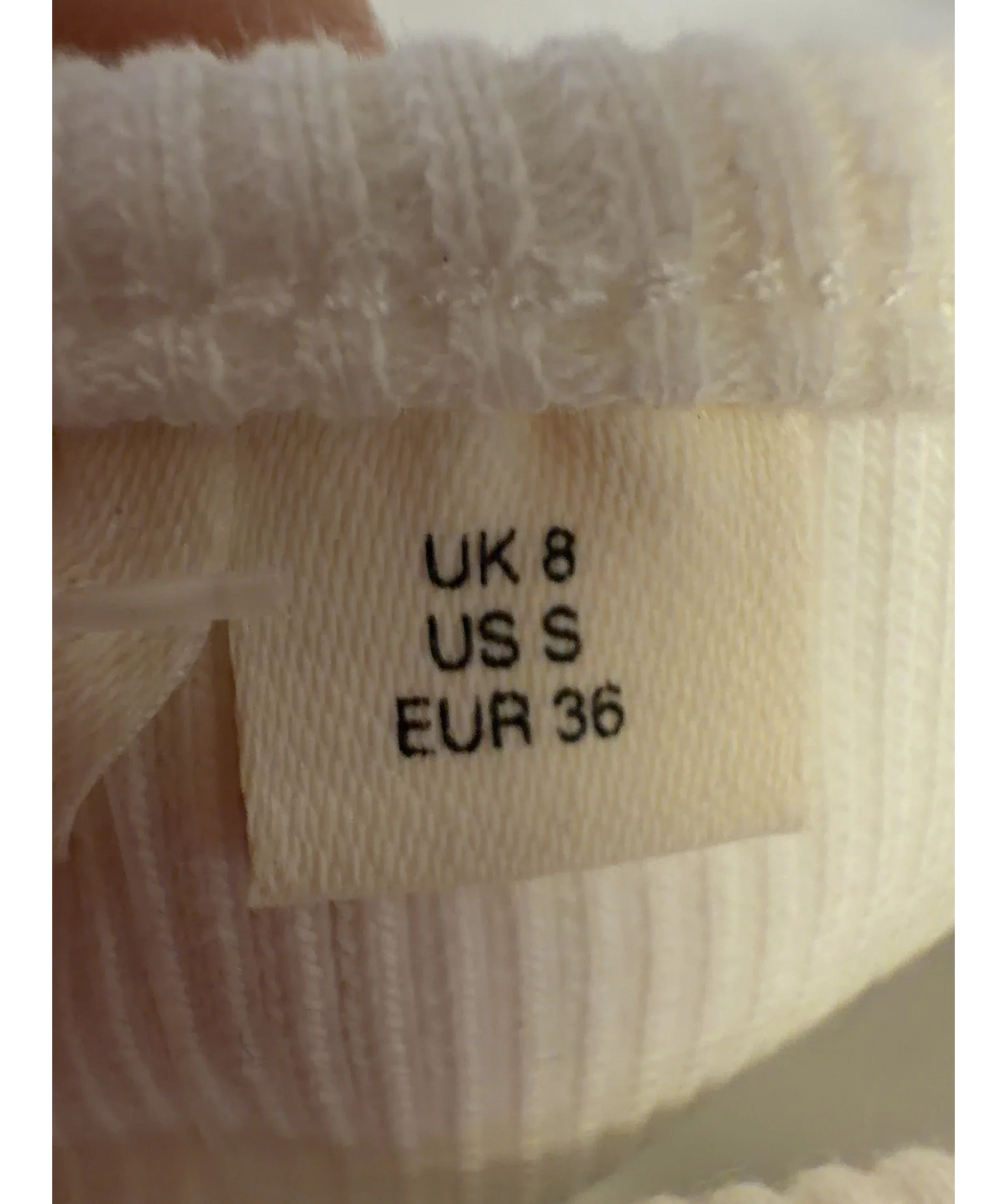 The Frolic White exclusive cotton rich bead flower front vest top, size UK 8 — care label