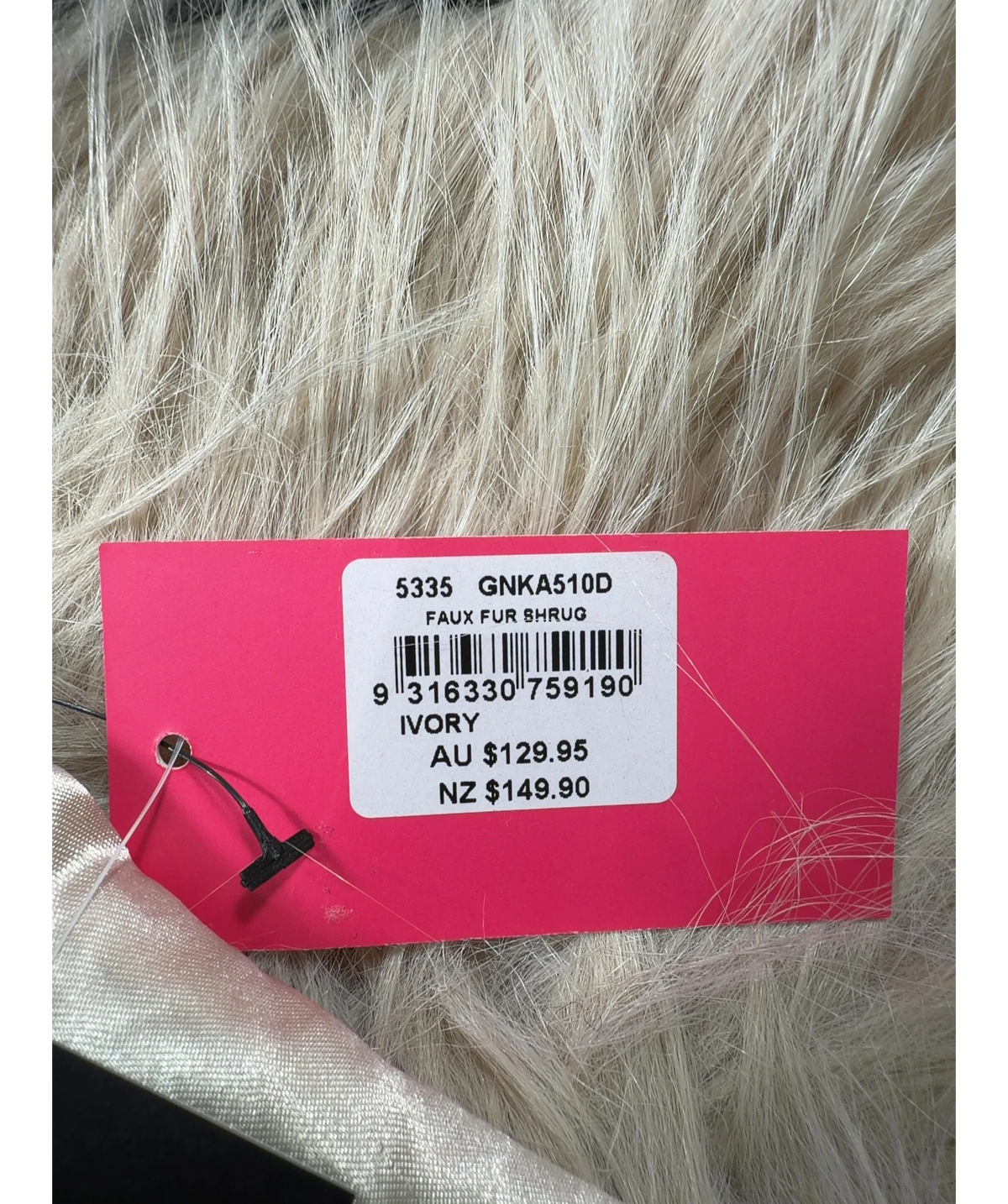 The two Mrs Grenvilles ivory FAUX FUR SHRUG — label