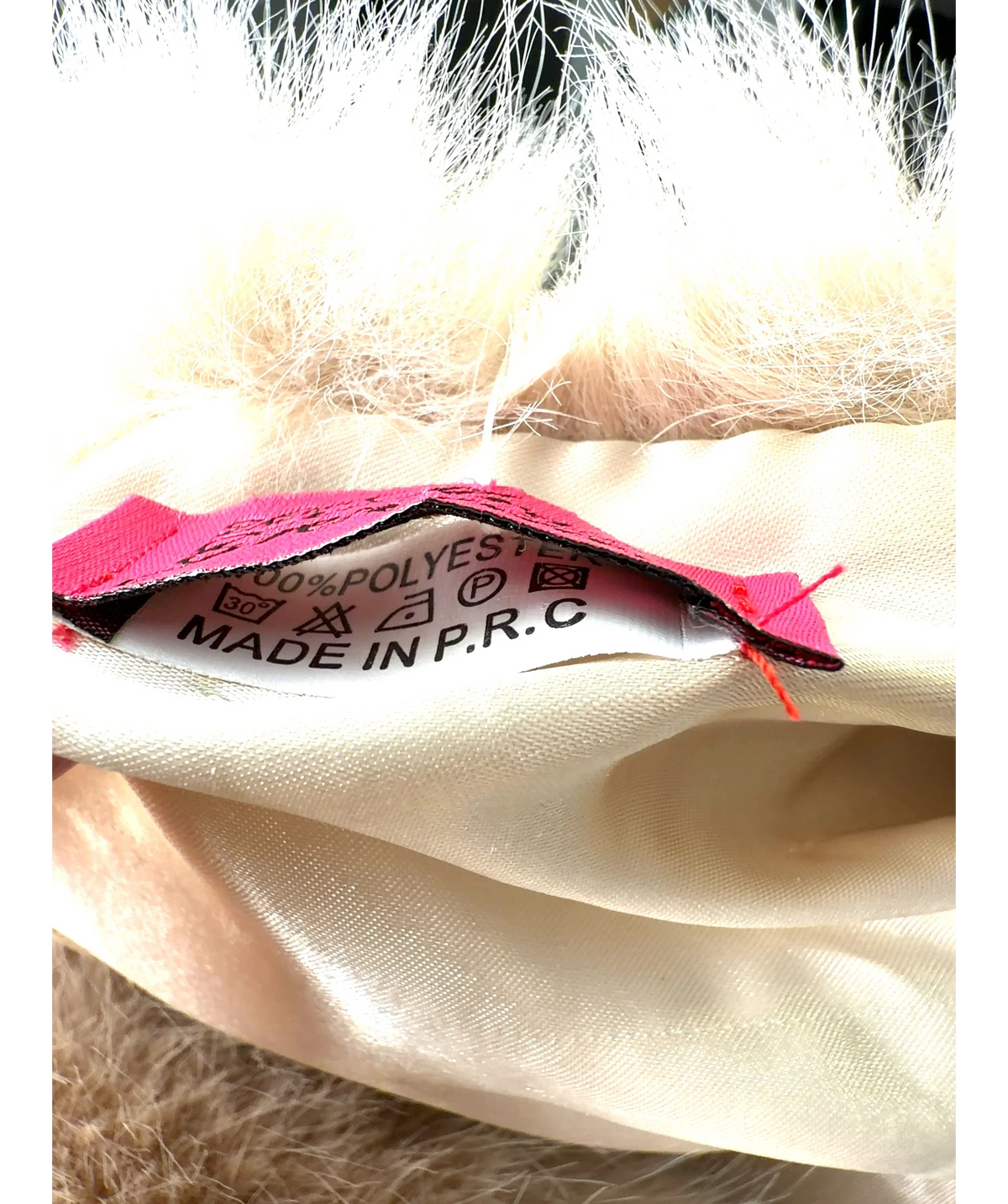 The Two Mrs Grenvilles Beige Colour — care label