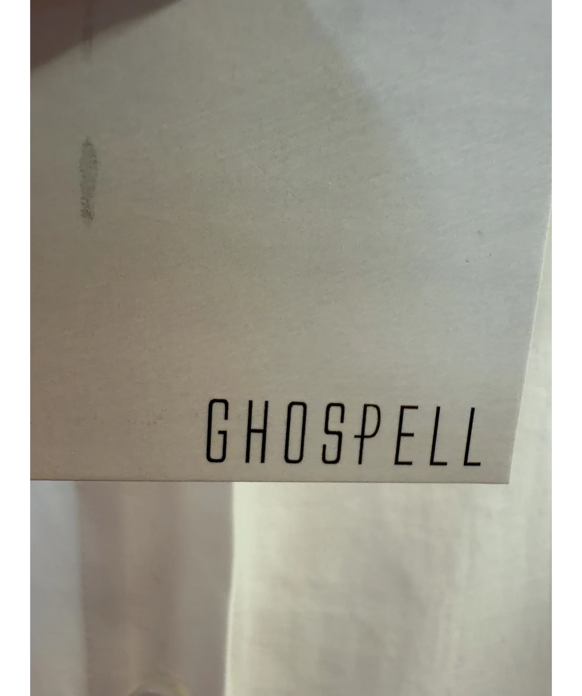 Ghospell White relaxed-fit white shirt with metal eyelets and rings along the collar, size UK M — detail