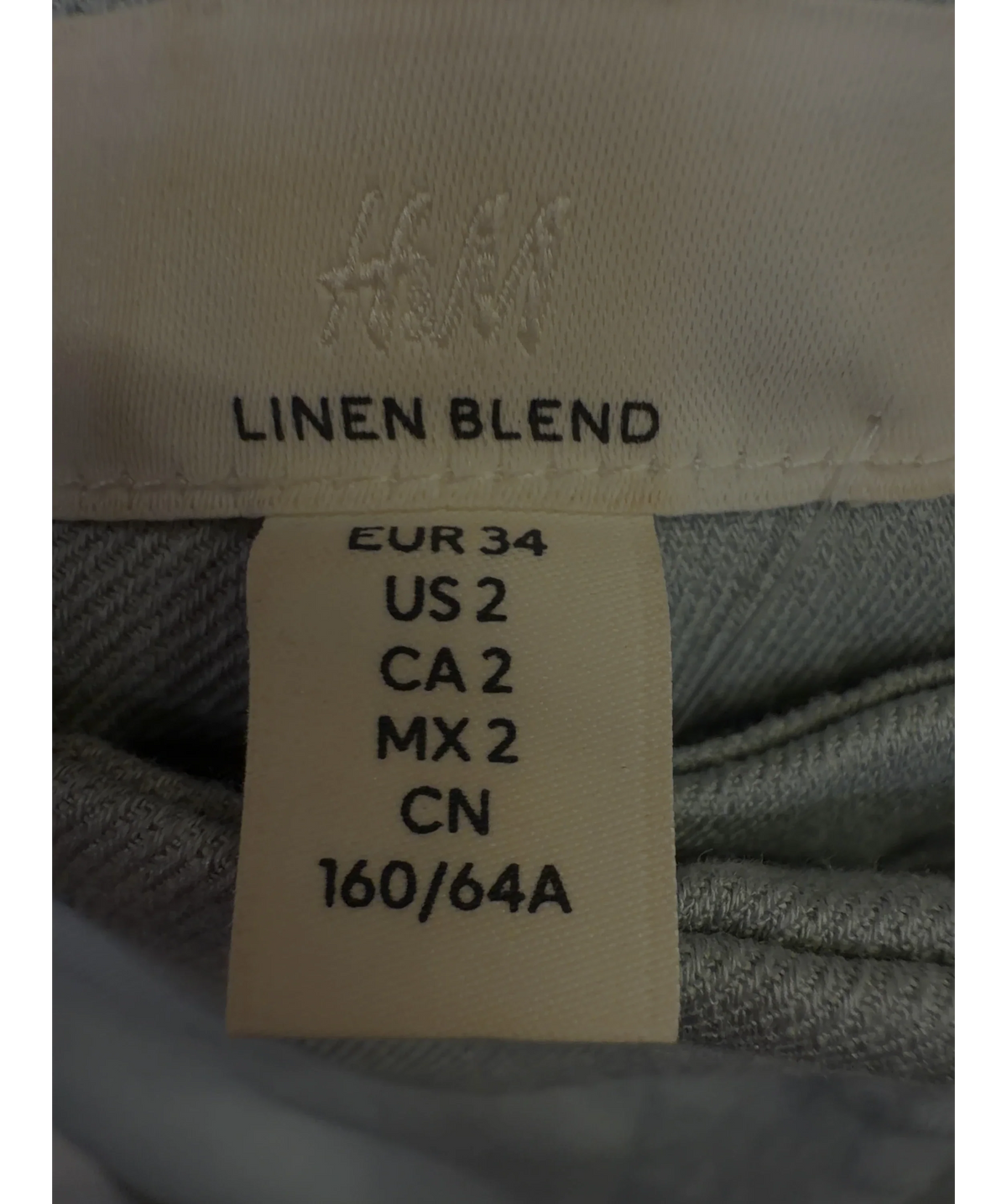 H&M Blue wide-leg linen blend trousers, size UK 6 — care label