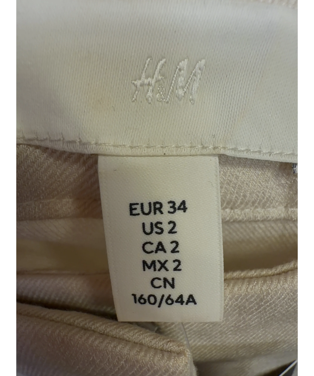H&M Cream high-waisted wide-leg trouser, size UK 6 — care label