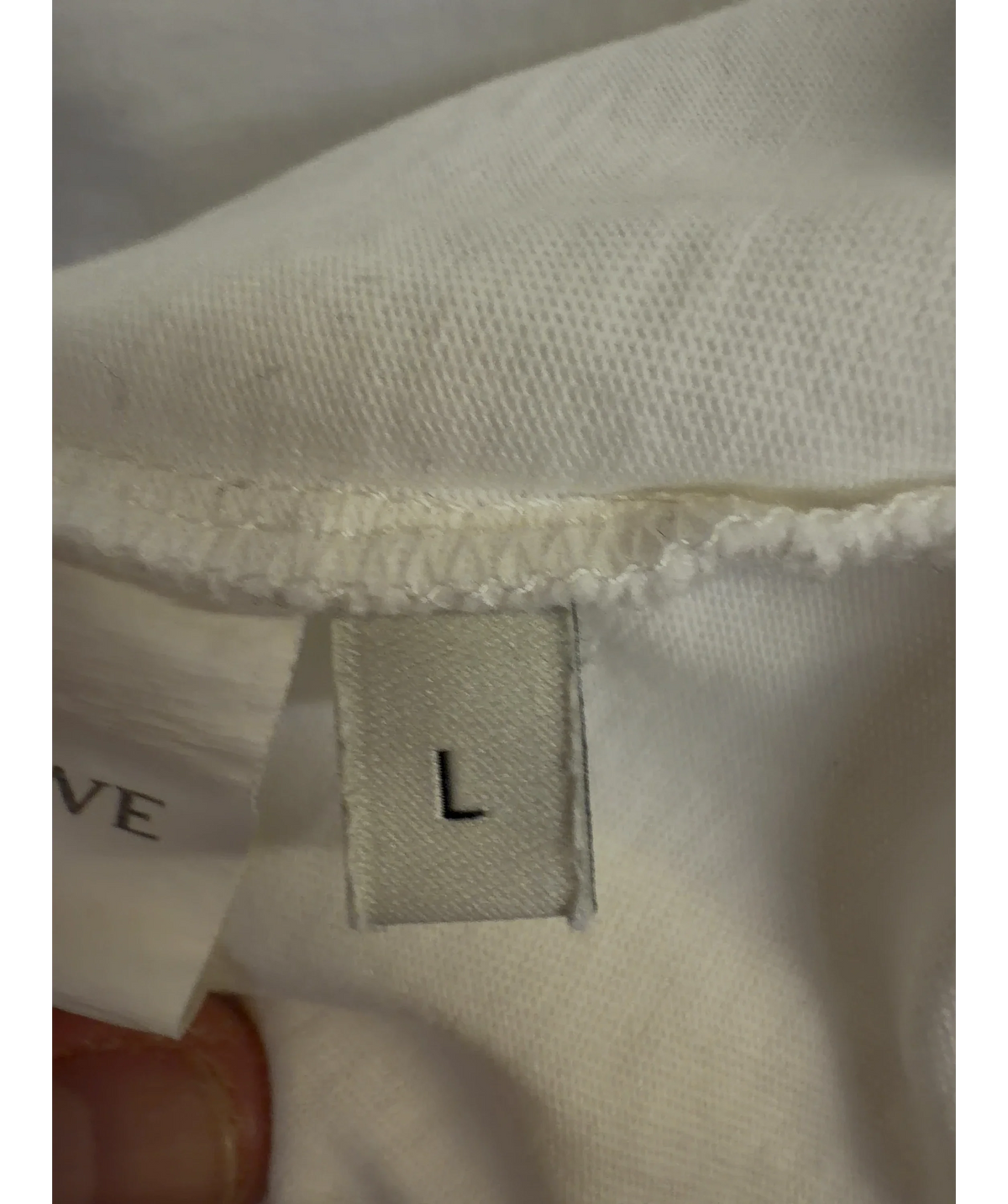 Loewe White Colour, size UK L — care label