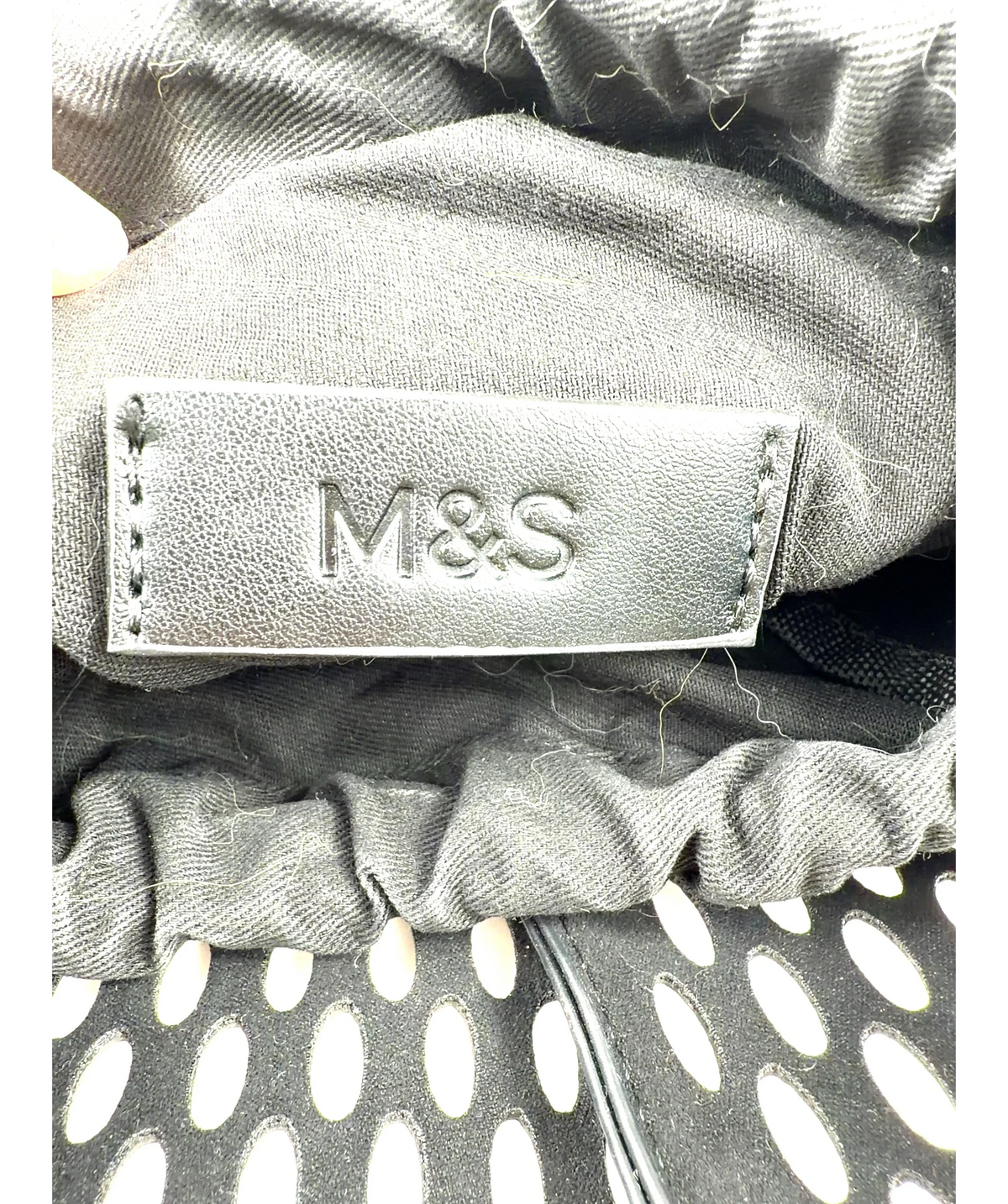 M&S Black Faux Leather Laser Cut Tulip Bucket Bag — care label